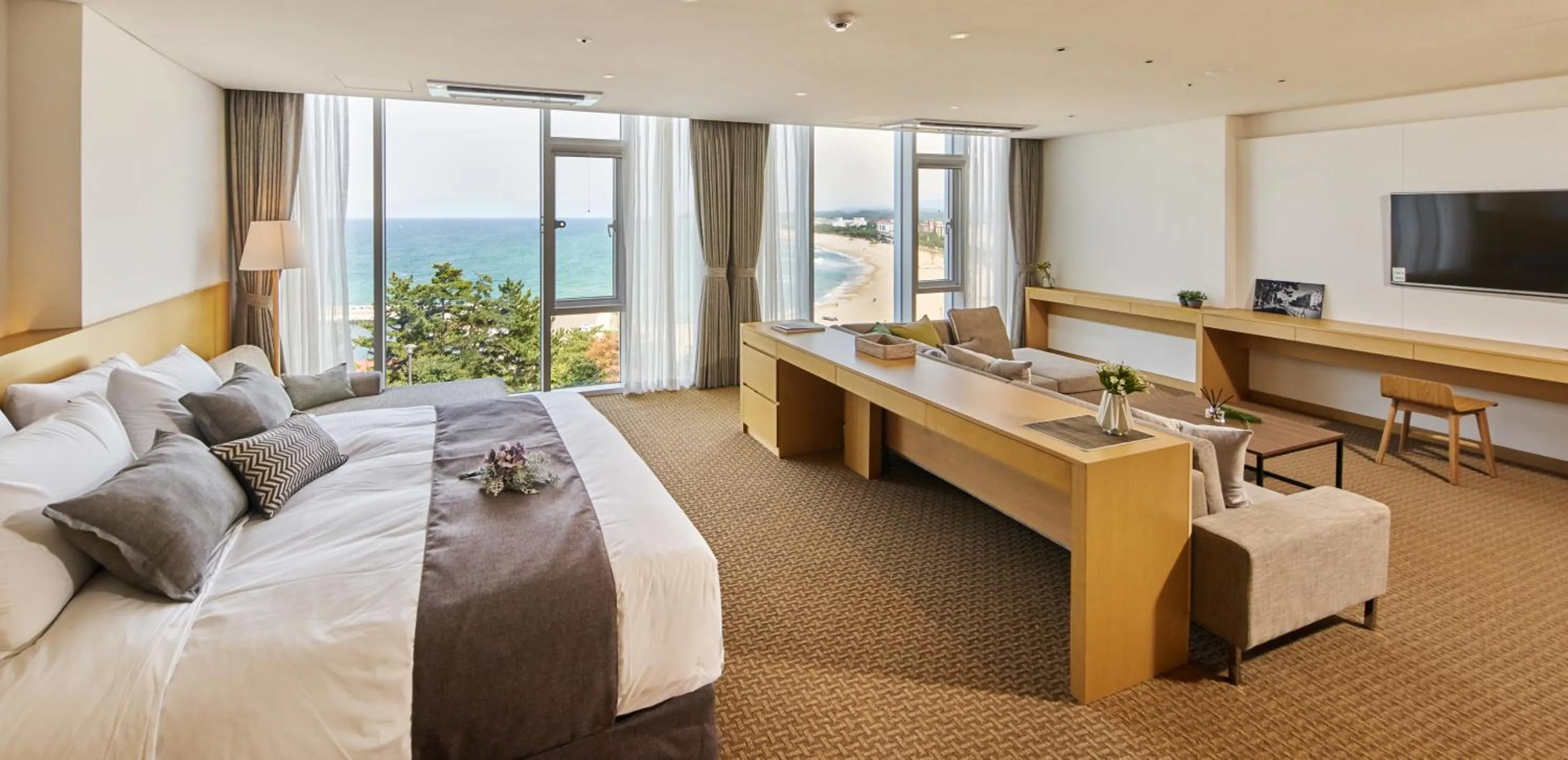 Bed in Naksan Beach Hotel