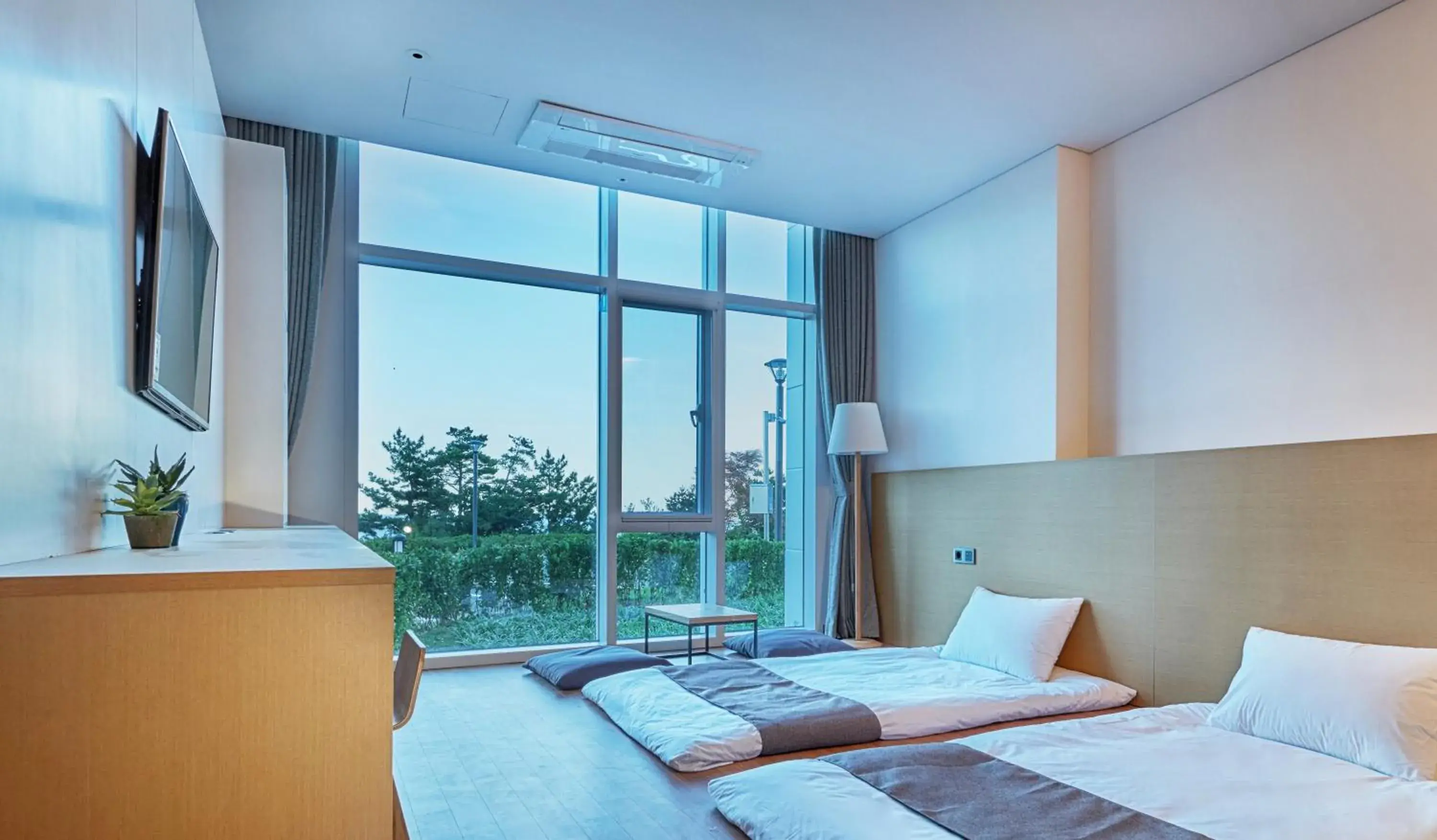 Bed in Naksan Beach Hotel Bed in Naksan Beach Hotel