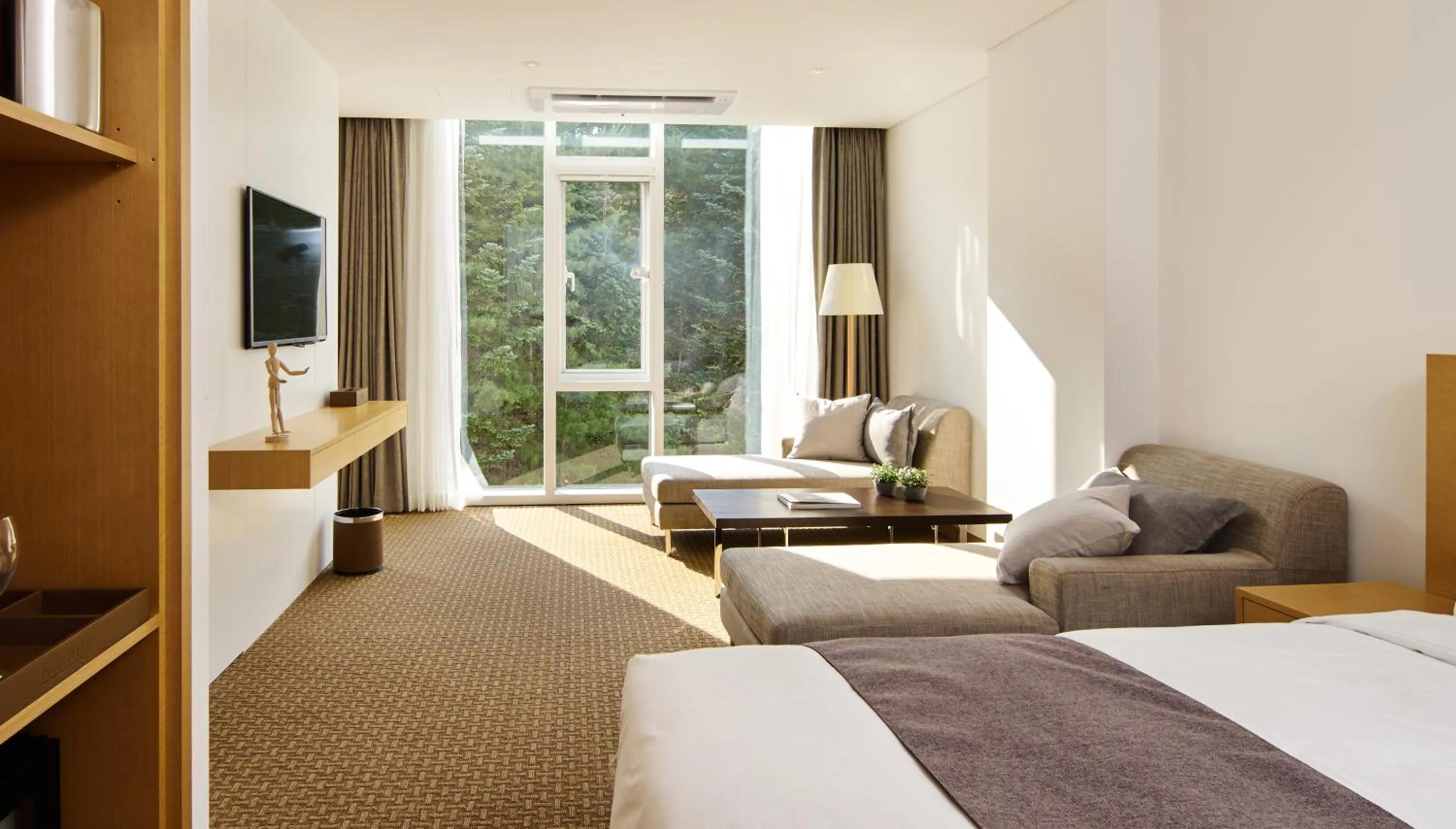 Bed in Naksan Beach Hotel