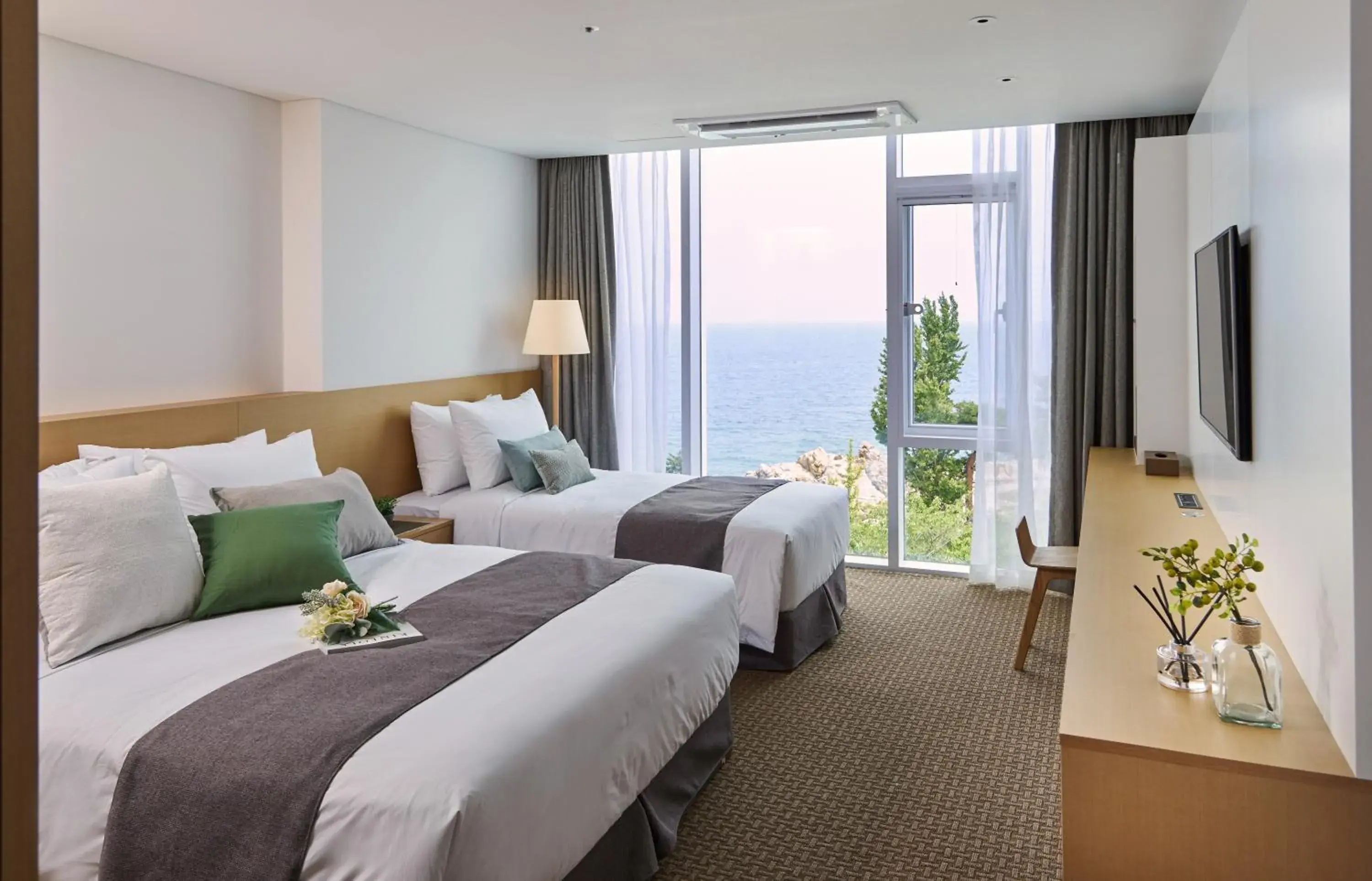 Bed in Naksan Beach Hotel Bed in Naksan Beach Hotel