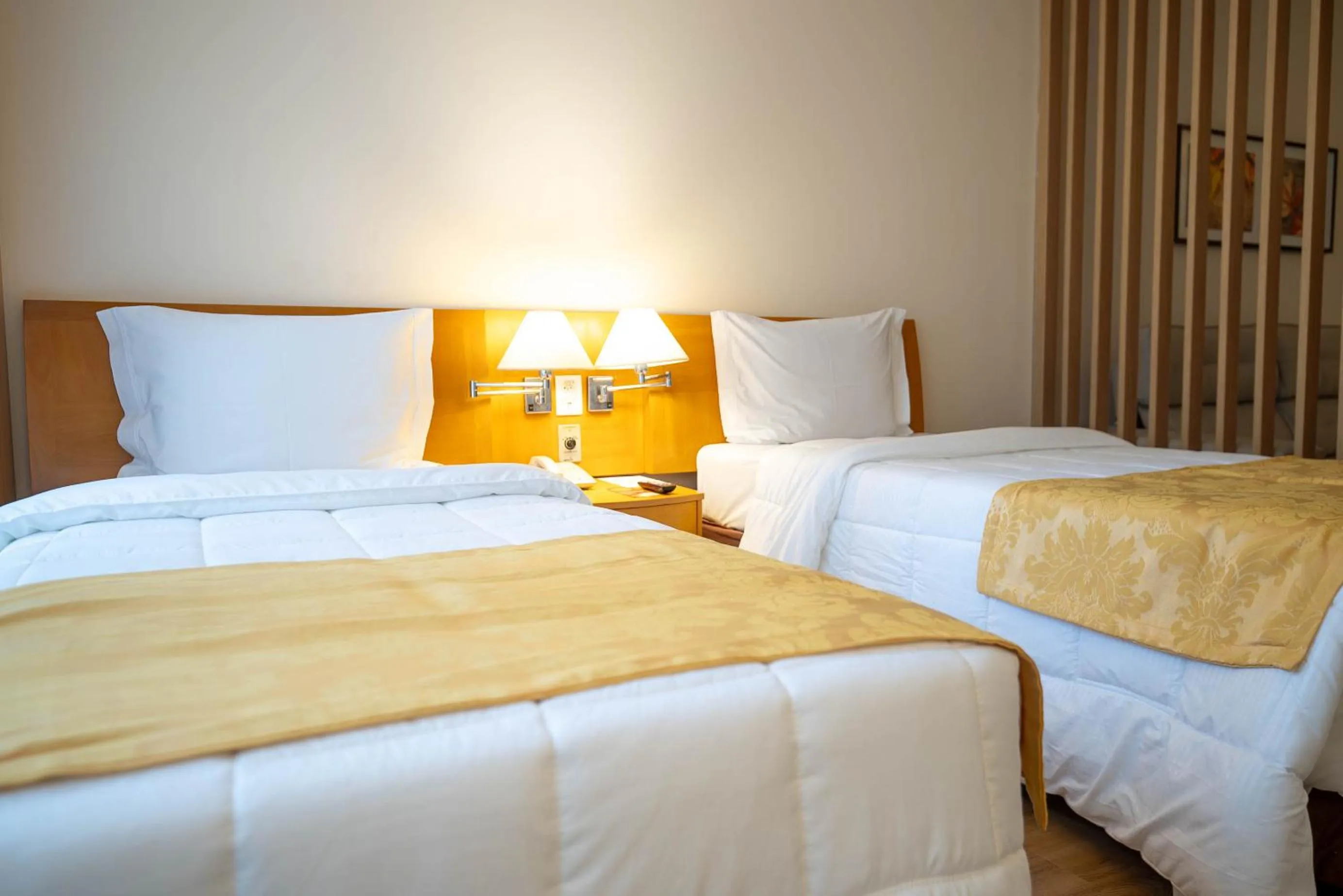 Bed in Sol Alphaville Hotel & Residence