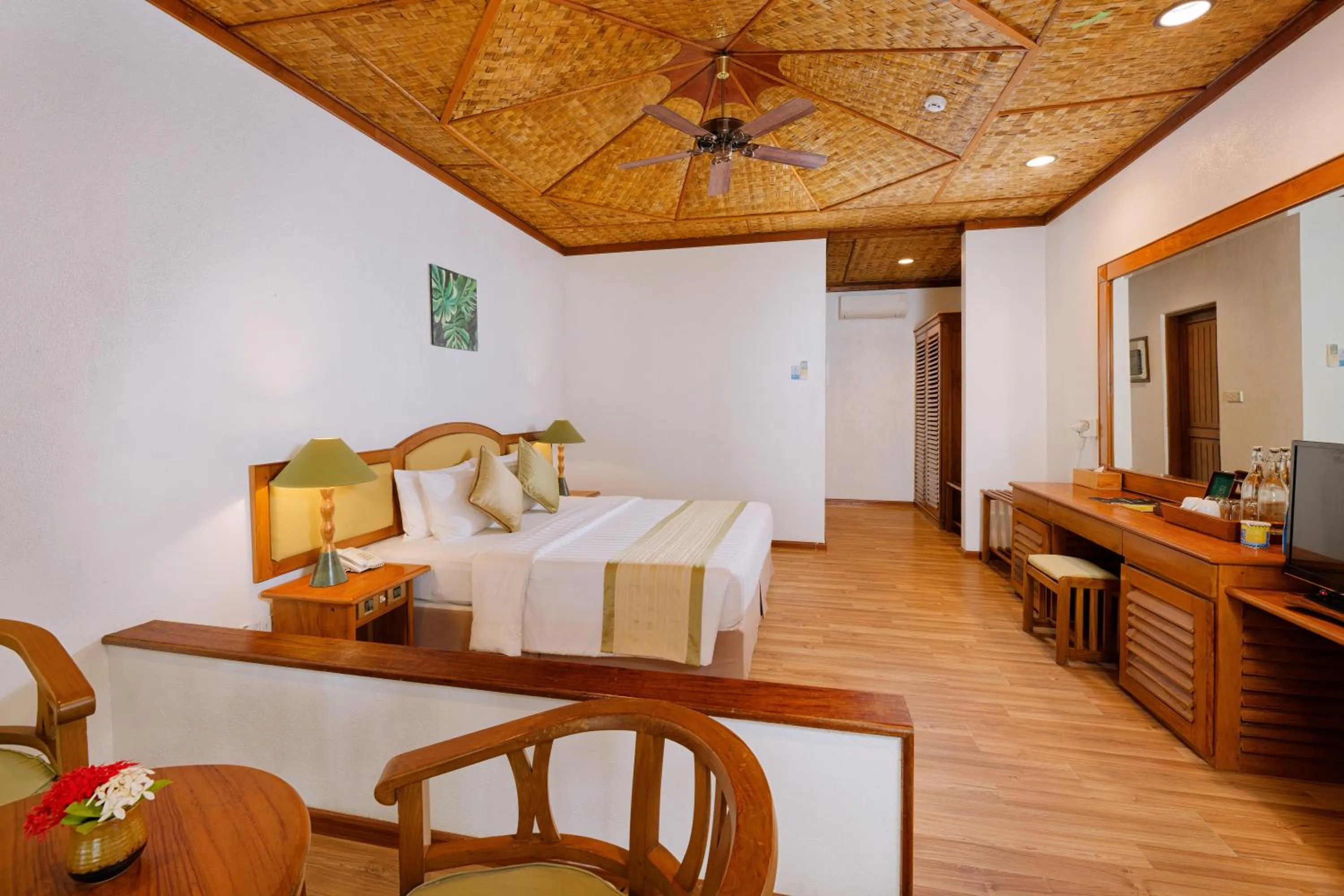 Photo of the whole room, Bed in Bandos Maldives