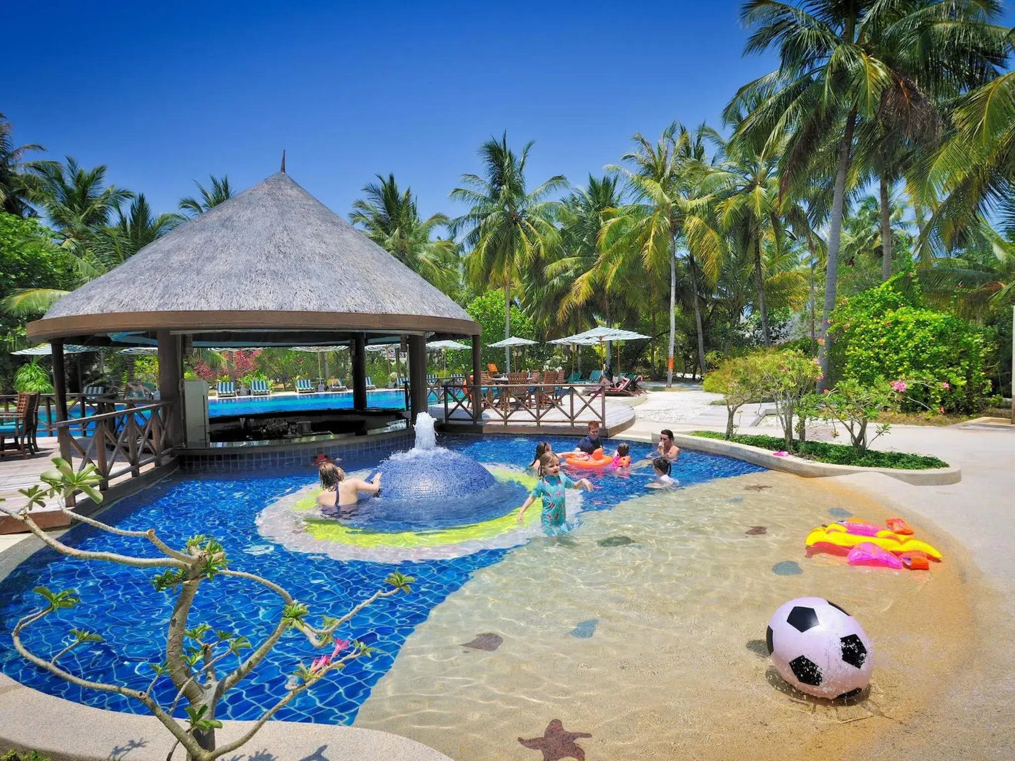 Swimming pool in Bandos Maldives Swimming pool in Bandos Maldives