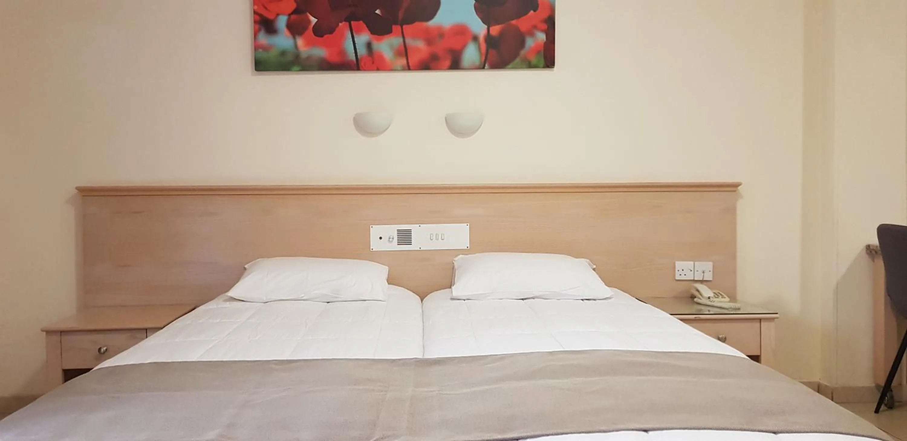 Bed in Senator Hotel Apartments - Adults Only