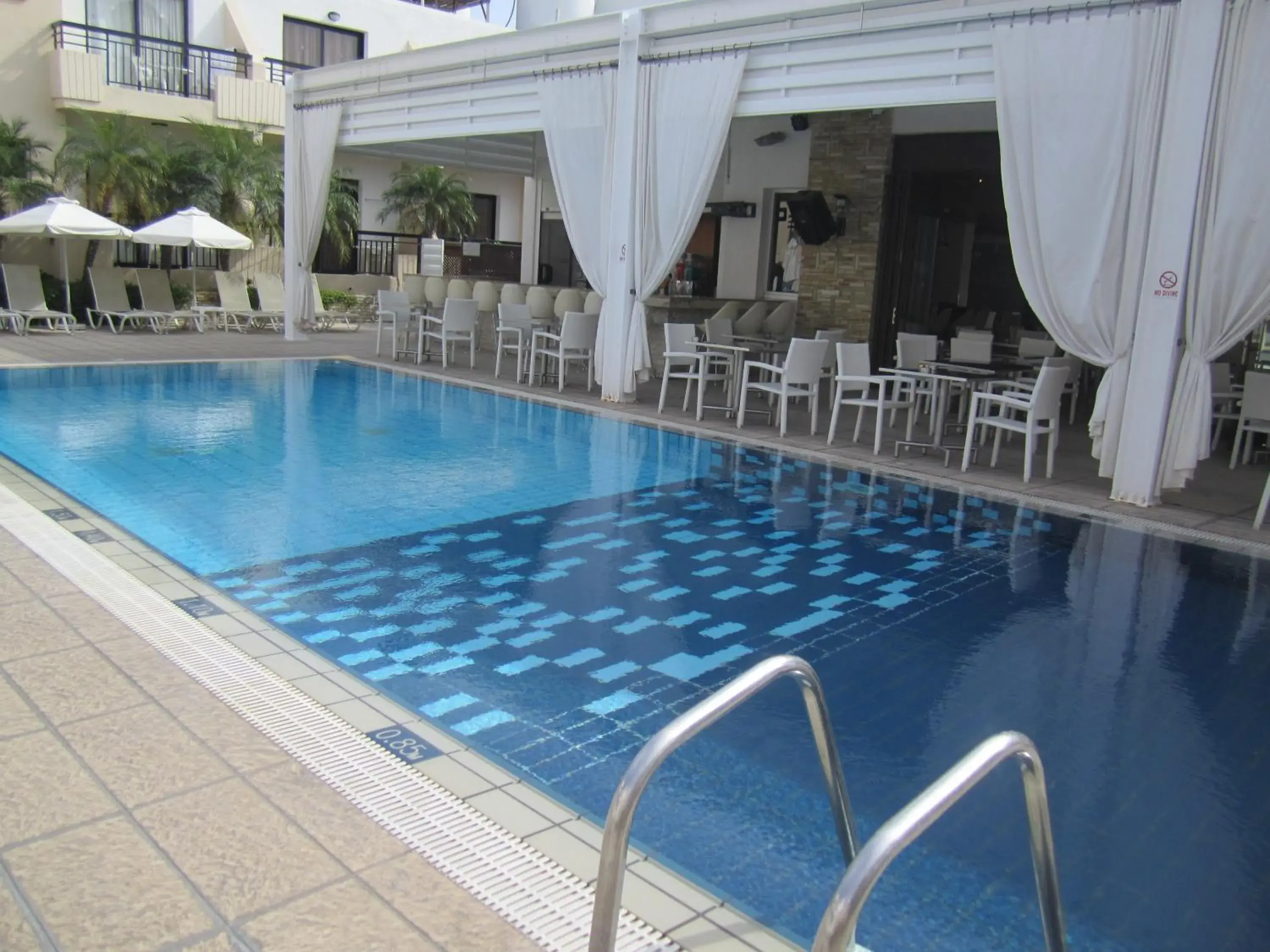 Swimming pool in Senator Hotel Apartments - Adults Only Swimming pool in Senator Hotel Apartments - Adults Only
