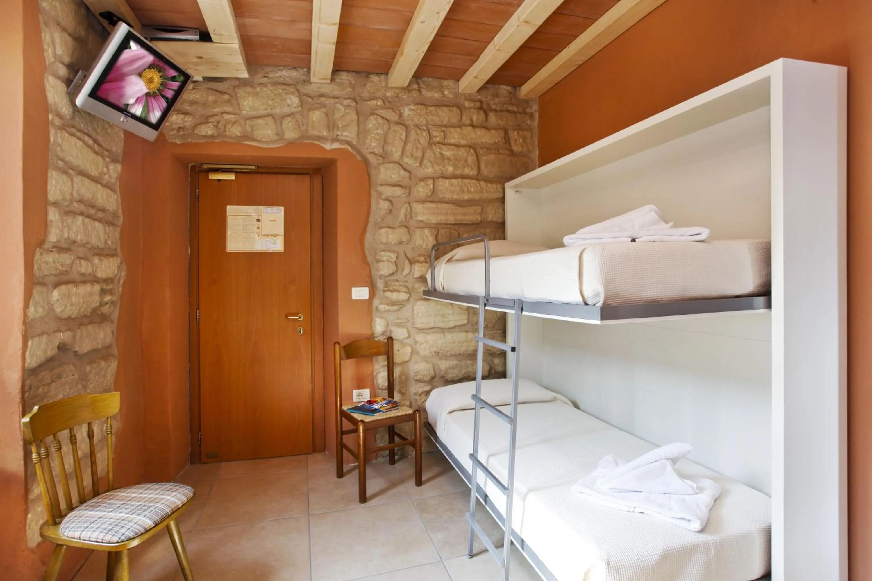 Bed in Albergo Garni Orchidea