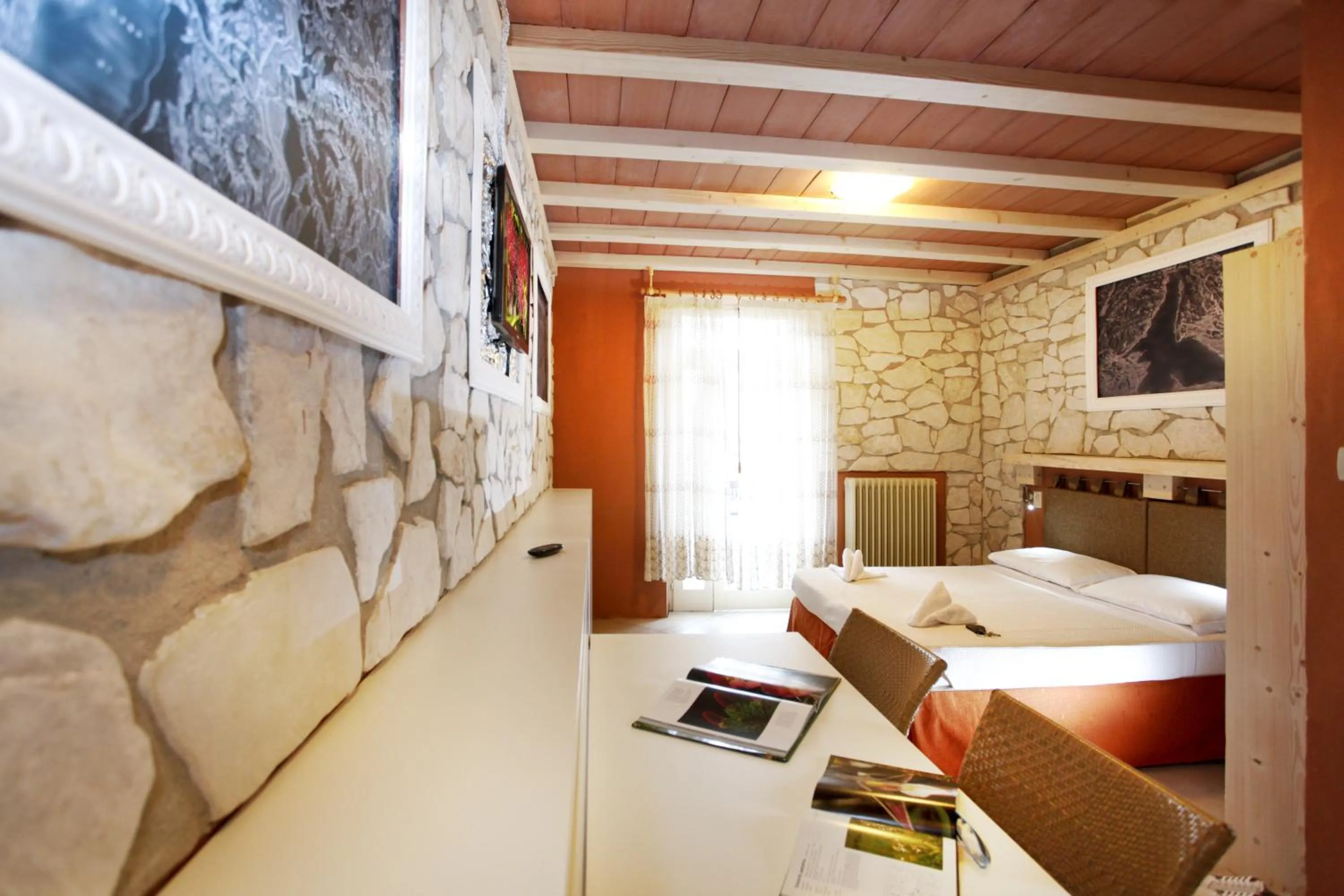 Photo of the whole room, Bed in Albergo Garni Orchidea