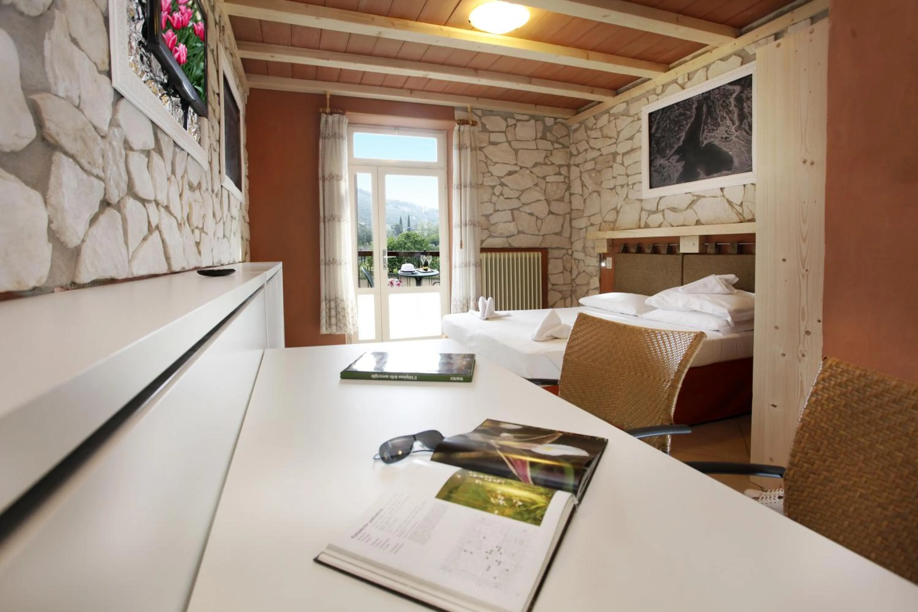 Photo of the whole room, Bed in Albergo Garni Orchidea