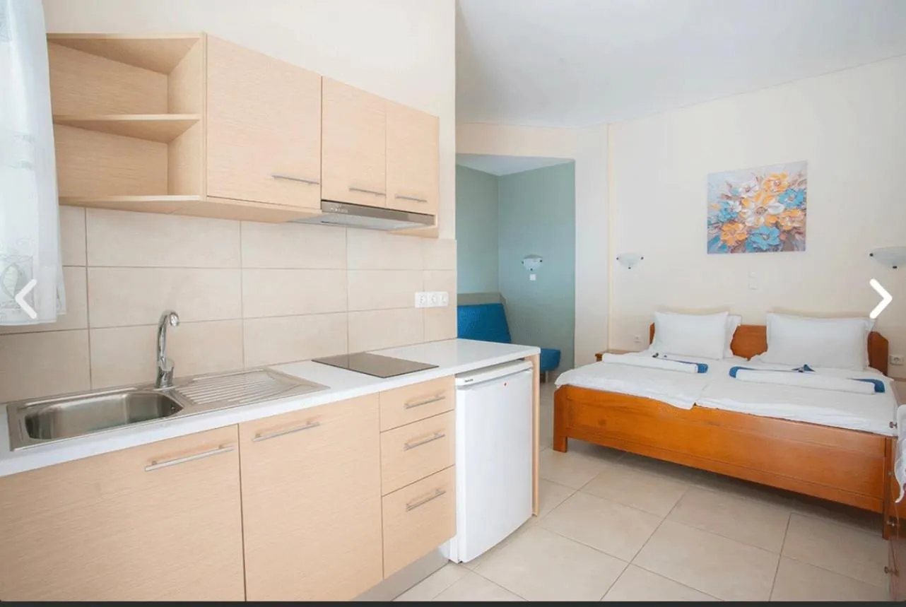 Bed in Geni Garden Apartments
