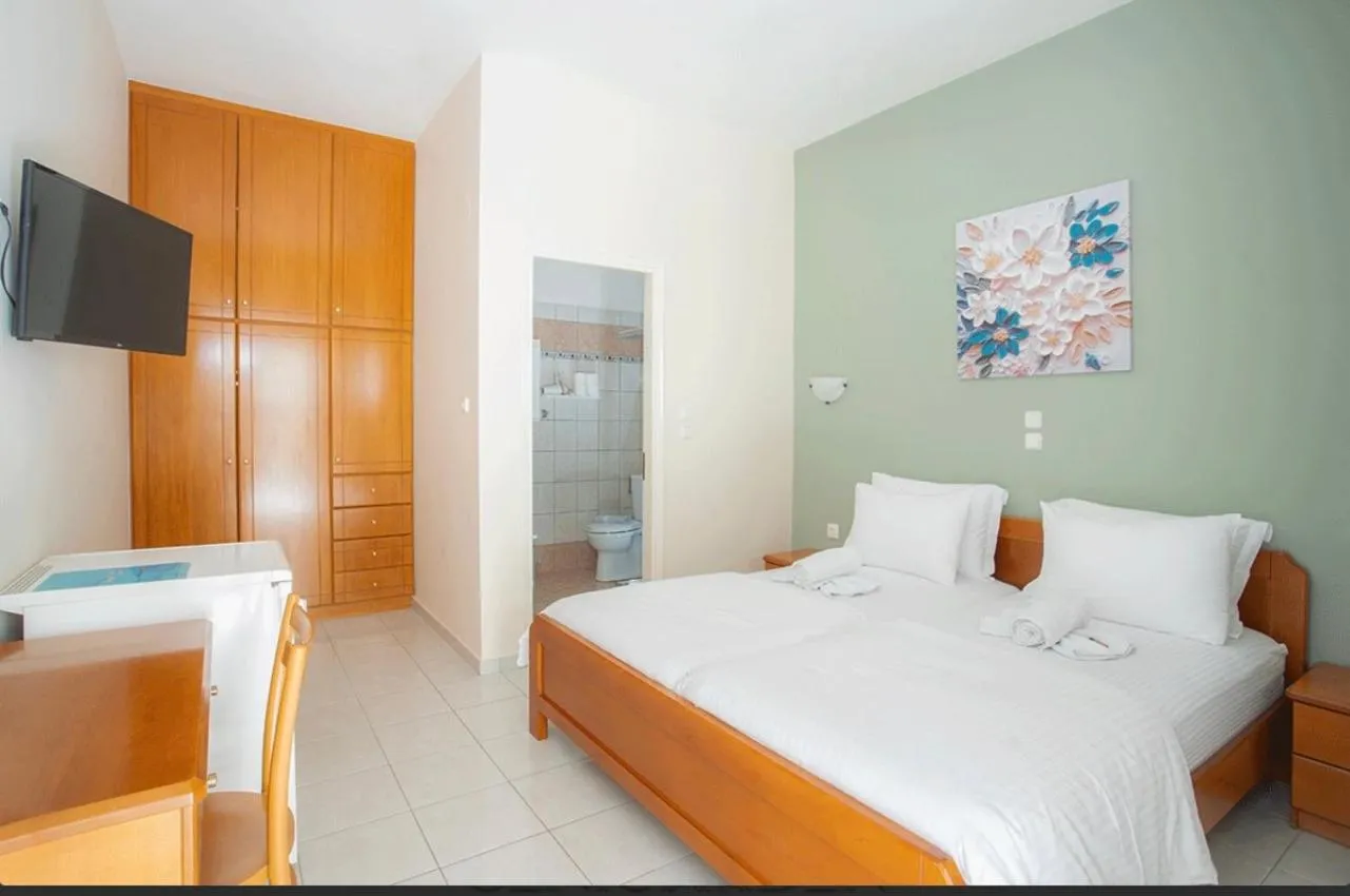 Bed in Geni Garden Apartments
