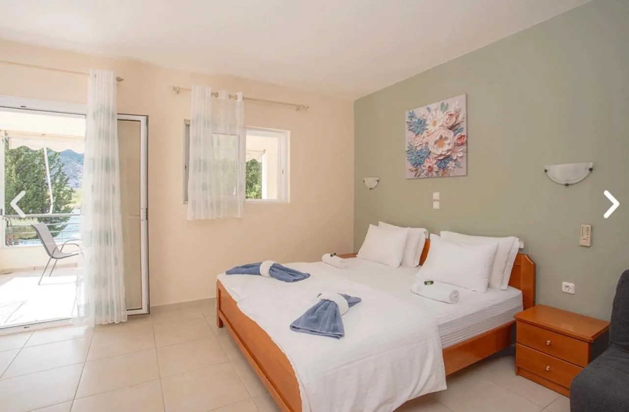 Bed in Geni Garden Apartments