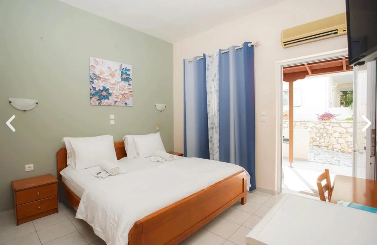 Bed in Geni Garden Apartments