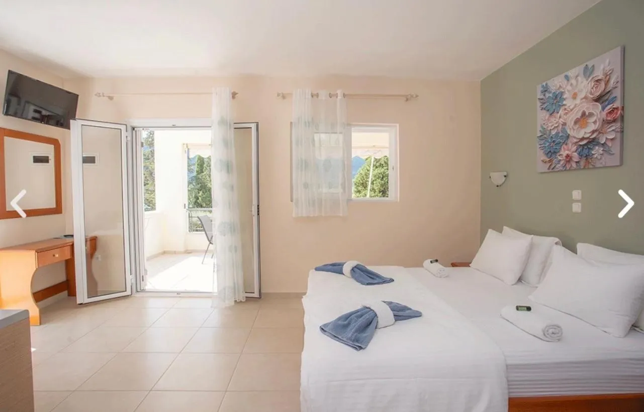 Bed in Geni Garden Apartments