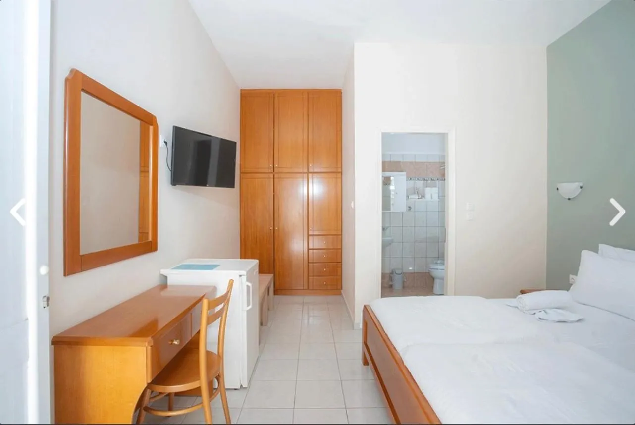 Bed in Geni Garden Apartments