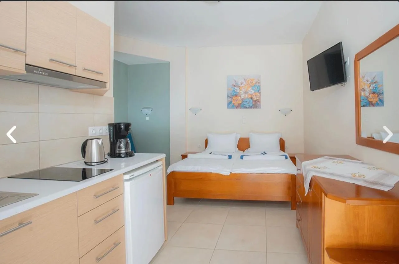 Bed in Geni Garden Apartments