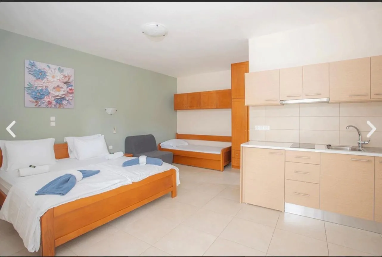 Bed in Geni Garden Apartments