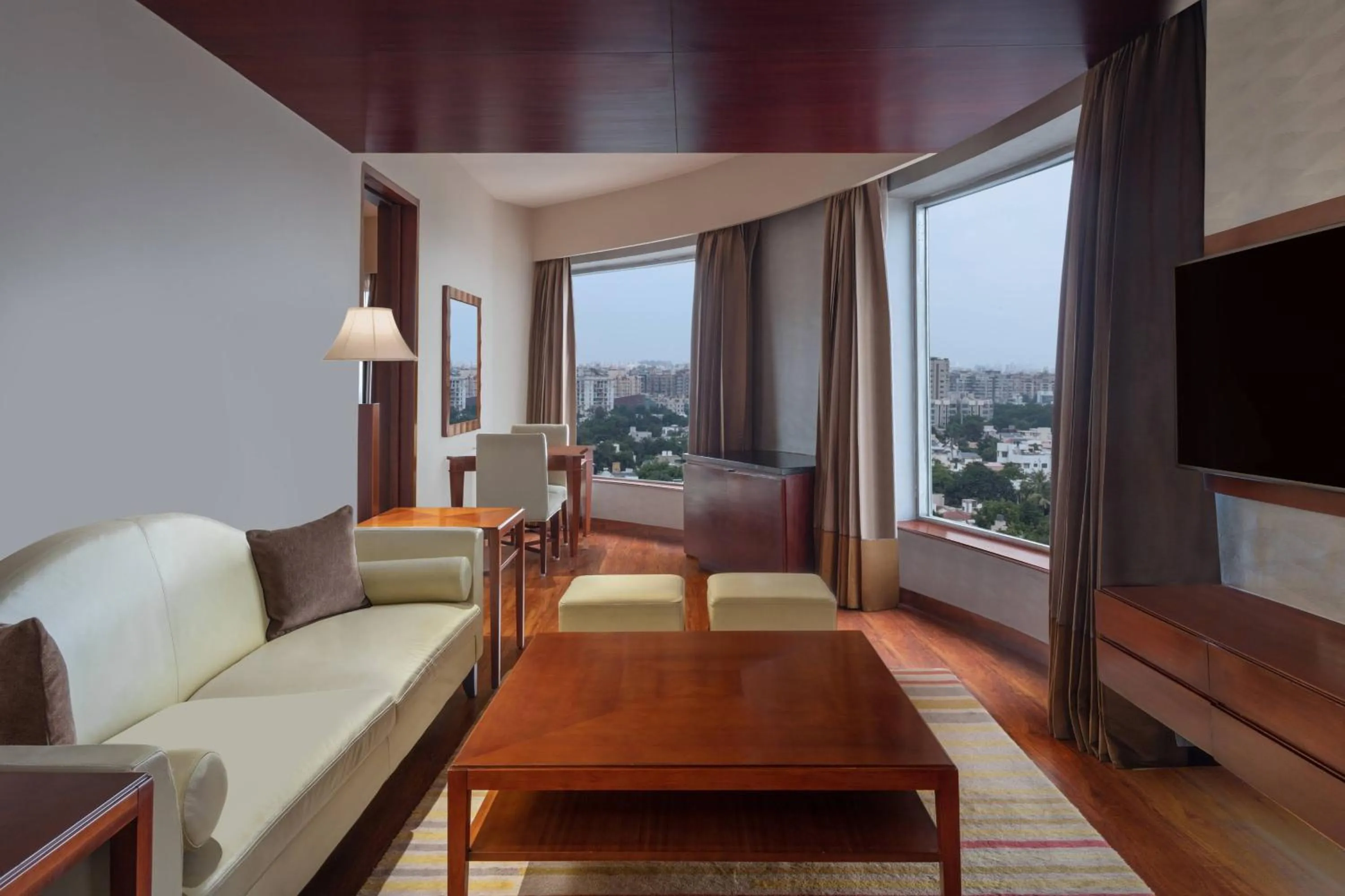 Photo of the whole room, Bed in Courtyard by Marriott Ahmedabad