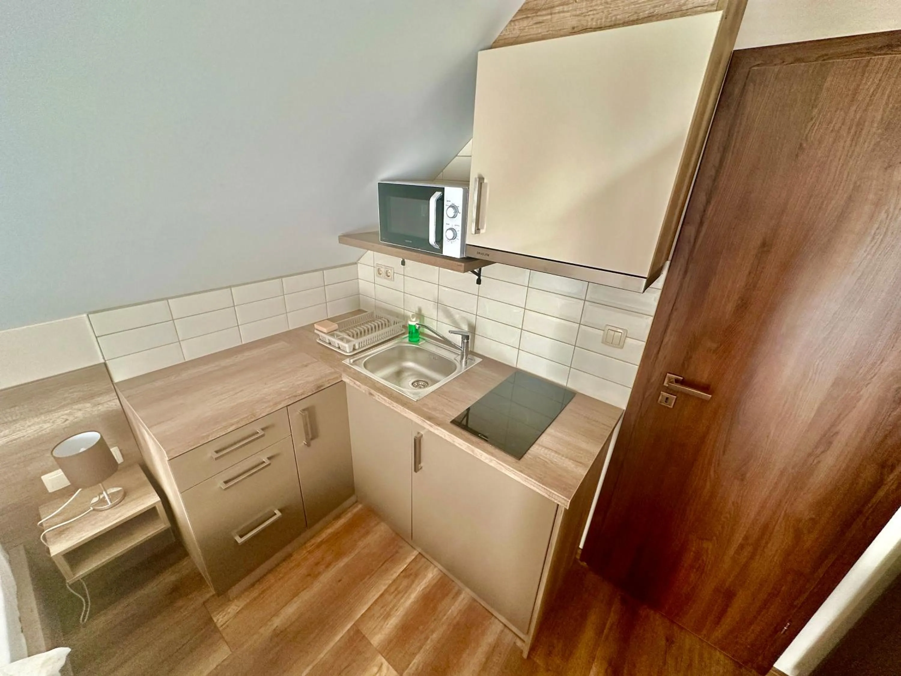 Kitchen or kitchenette in See Vendégház - Siófok