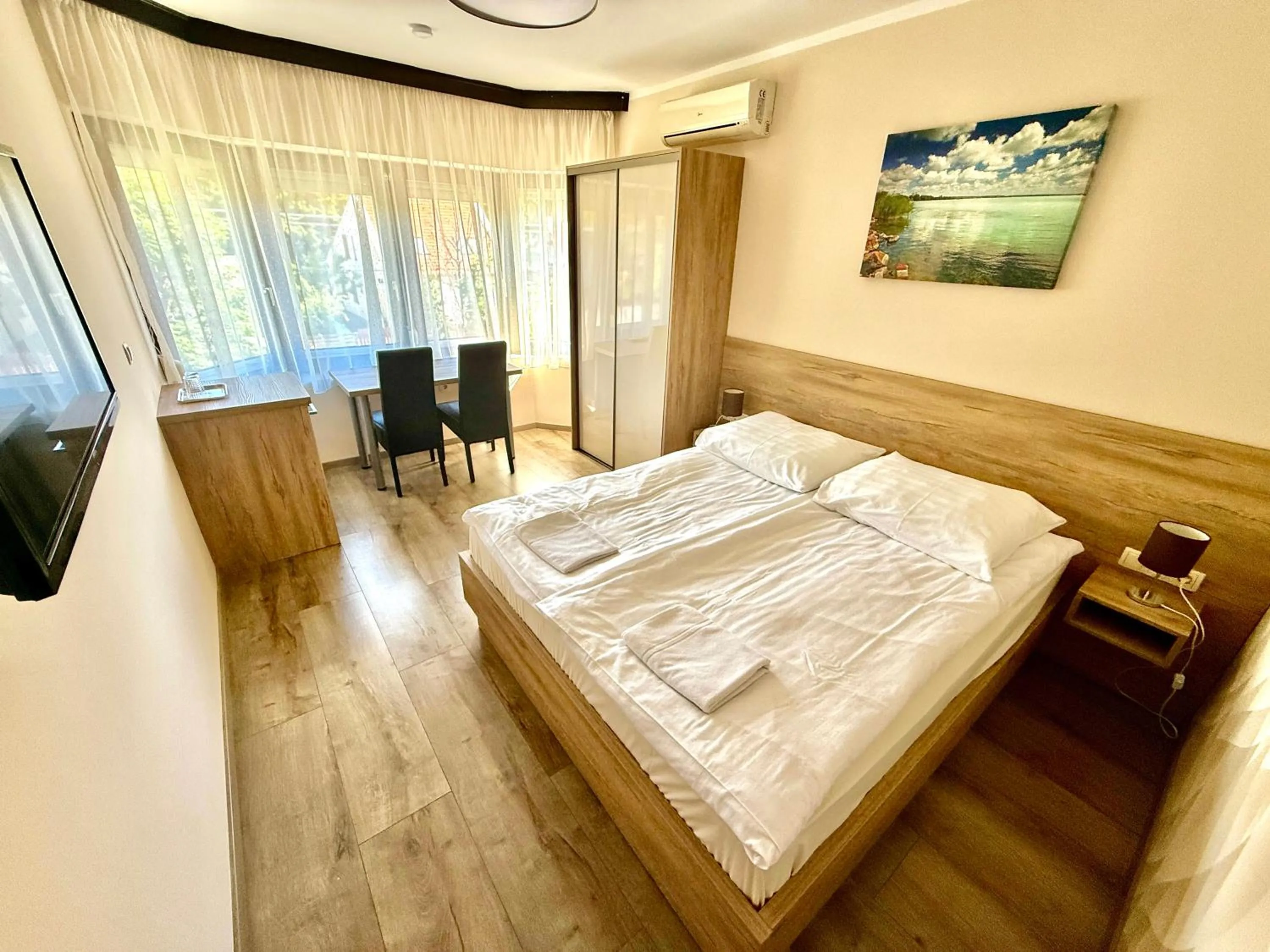 Photo of the whole room, Bed in See Vendégház - Siófok