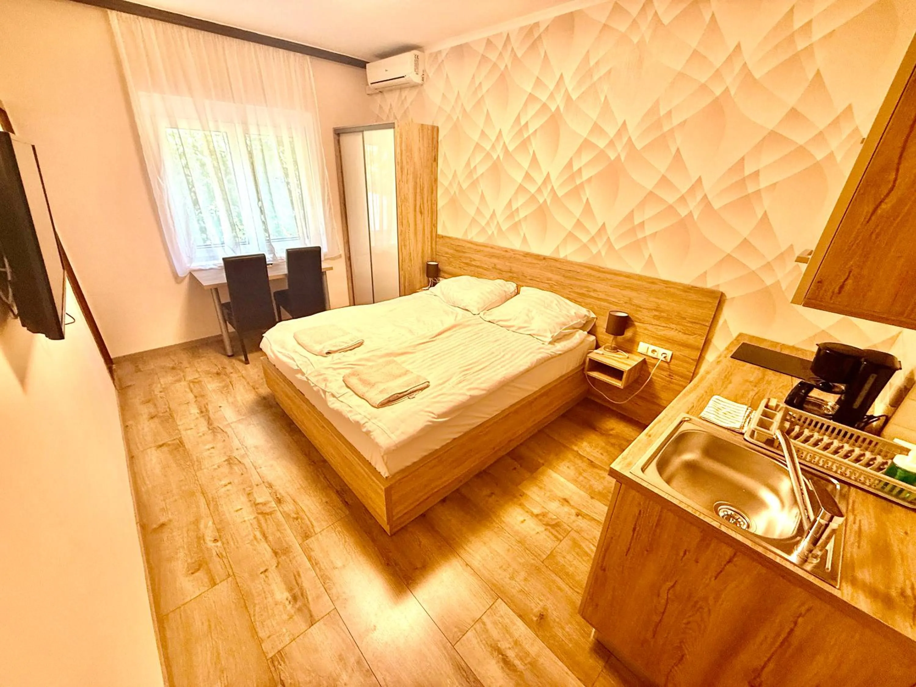 Photo of the whole room, Bed in See Vendégház - Siófok