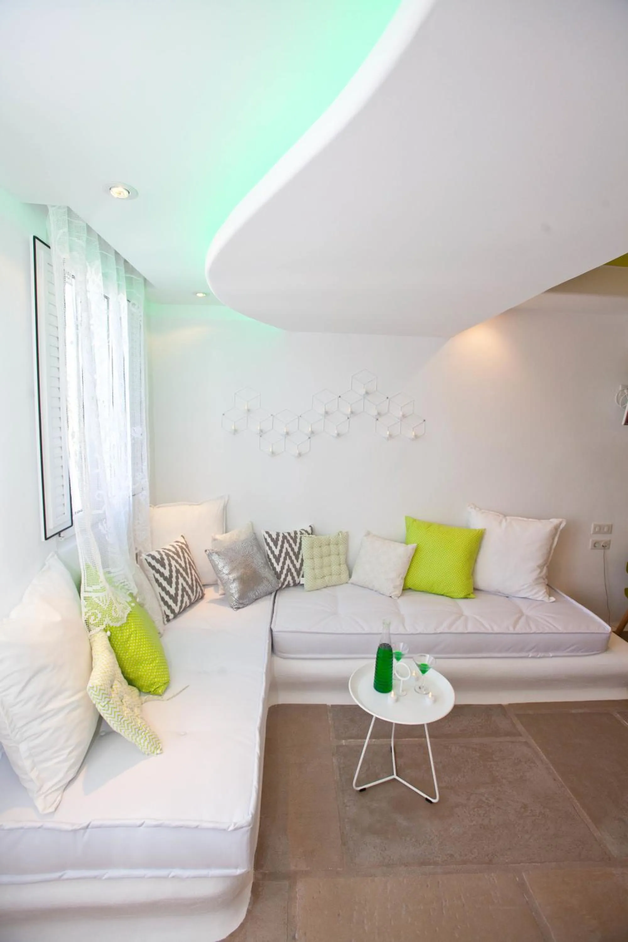 Living room, Bed in Golden Sun Hotel