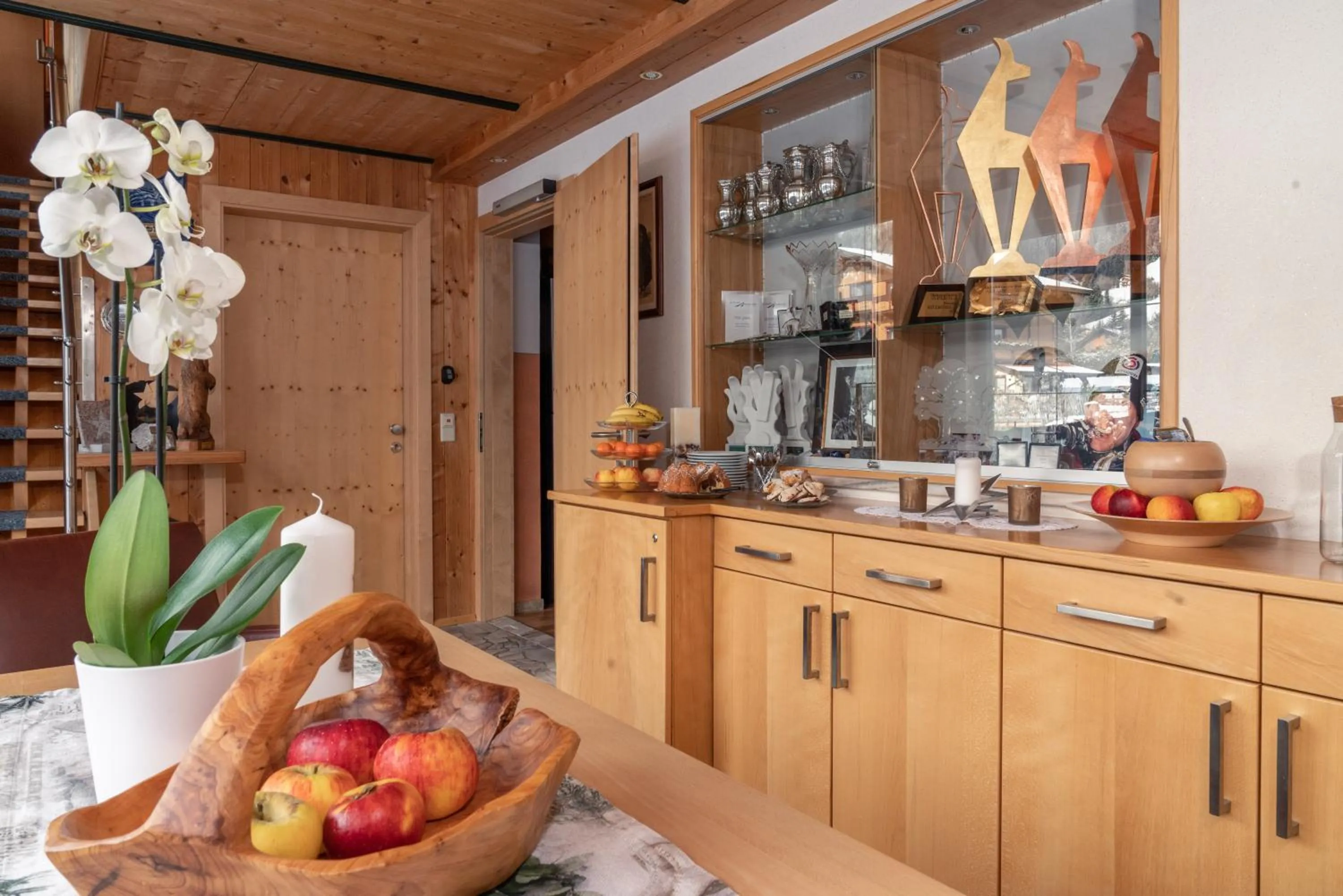 Communal lounge/ TV room in Wellnesshaus Reichelt