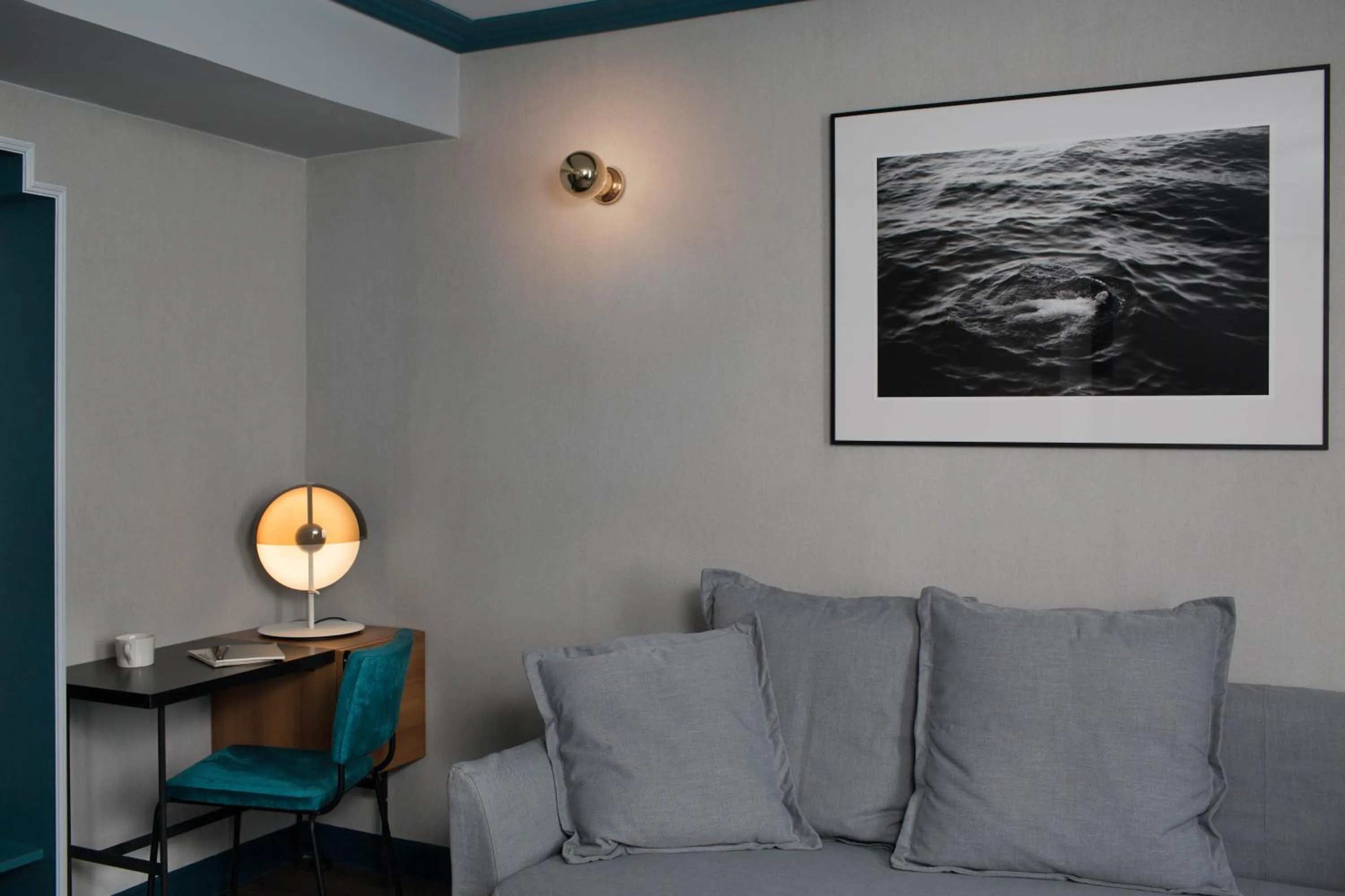 Seating area in Hôtel Louvre Piemont