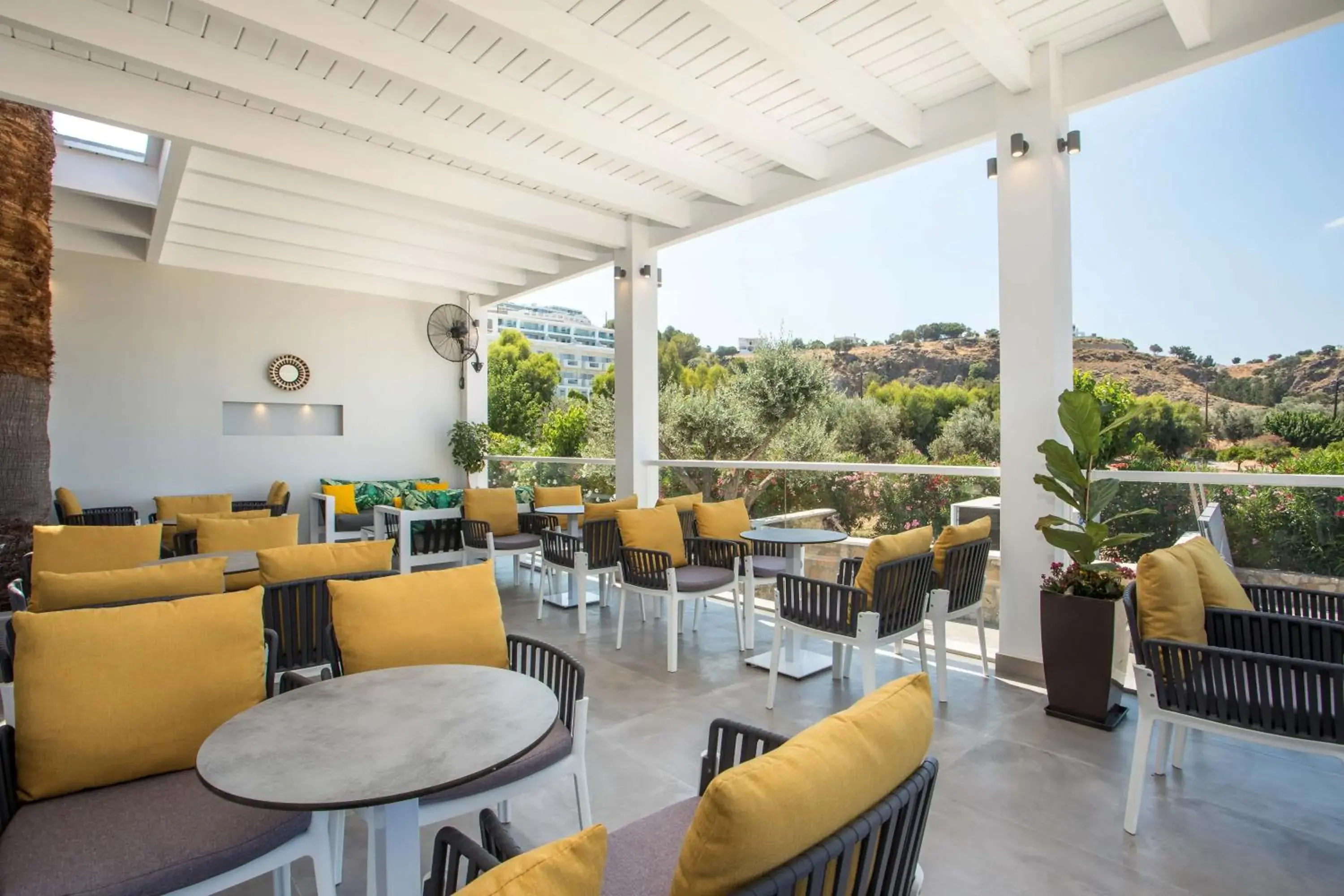 Lounge or bar in Lindos White Hotel & Suites Lounge or bar in Lindos White Hotel & Suites