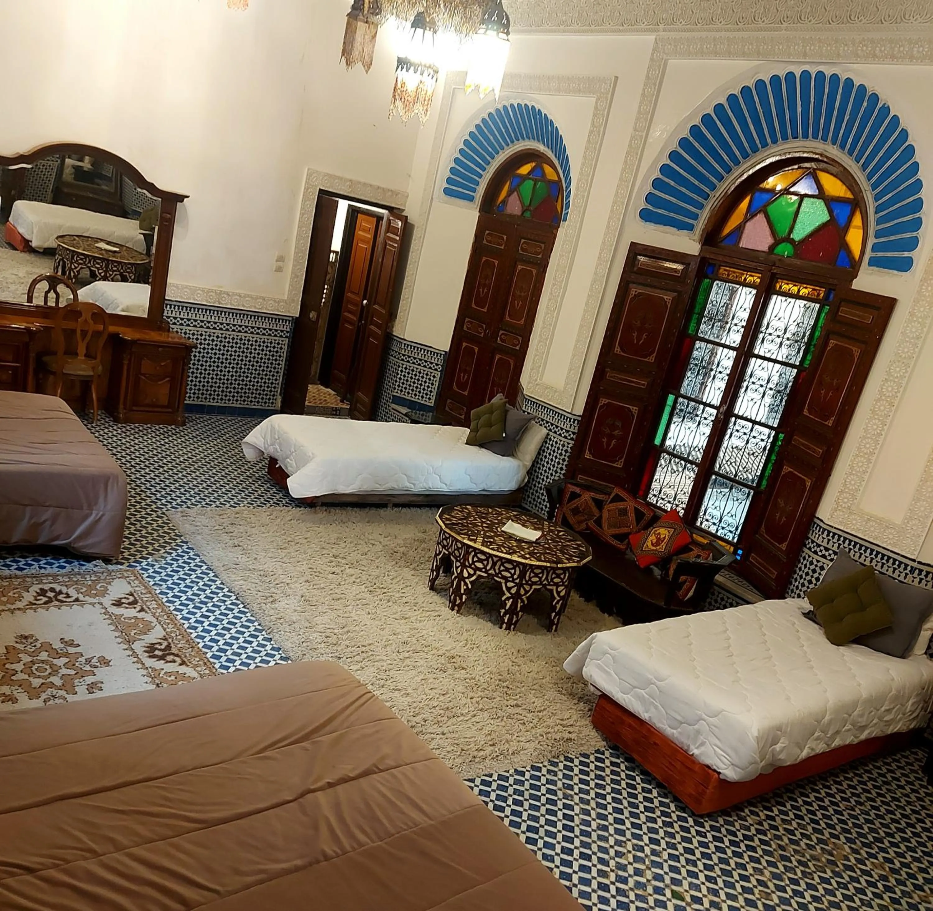Living room, Bed in Palais AL Firdaous