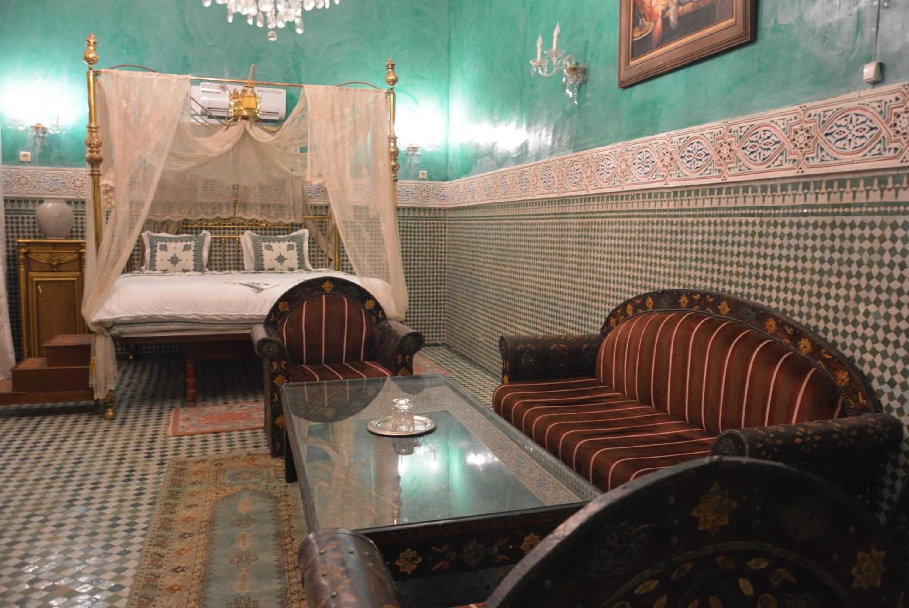 Seating area, Bed in Palais AL Firdaous