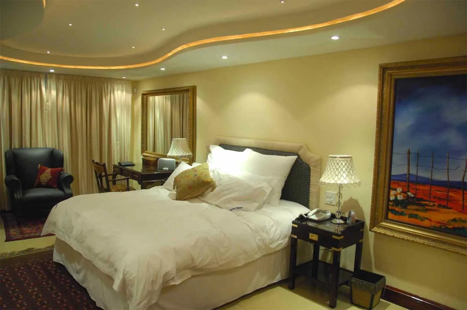 Bed in Kosmos Manor Guest House