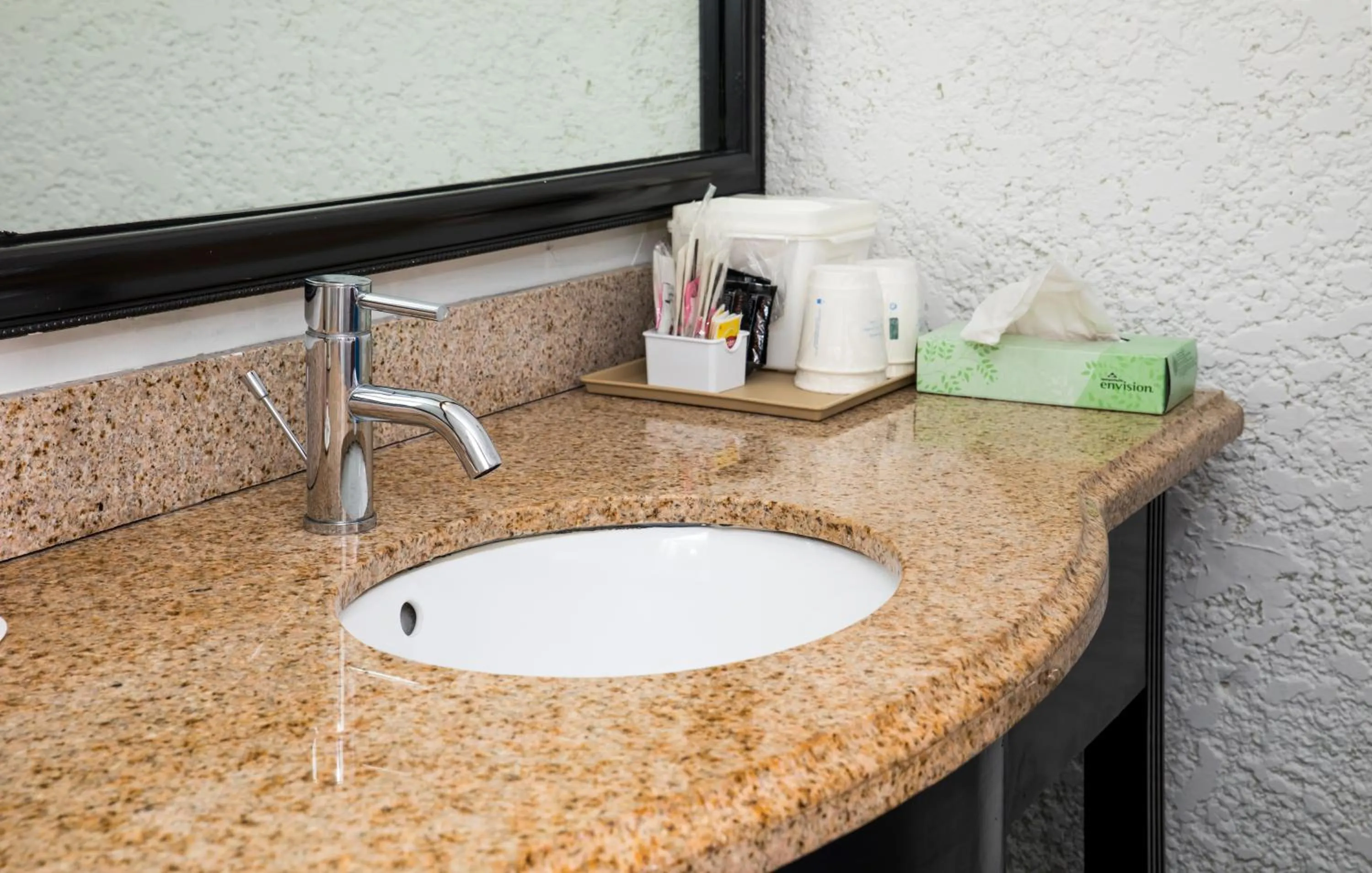 Bathroom in Days Inn by Wyndham Stuart