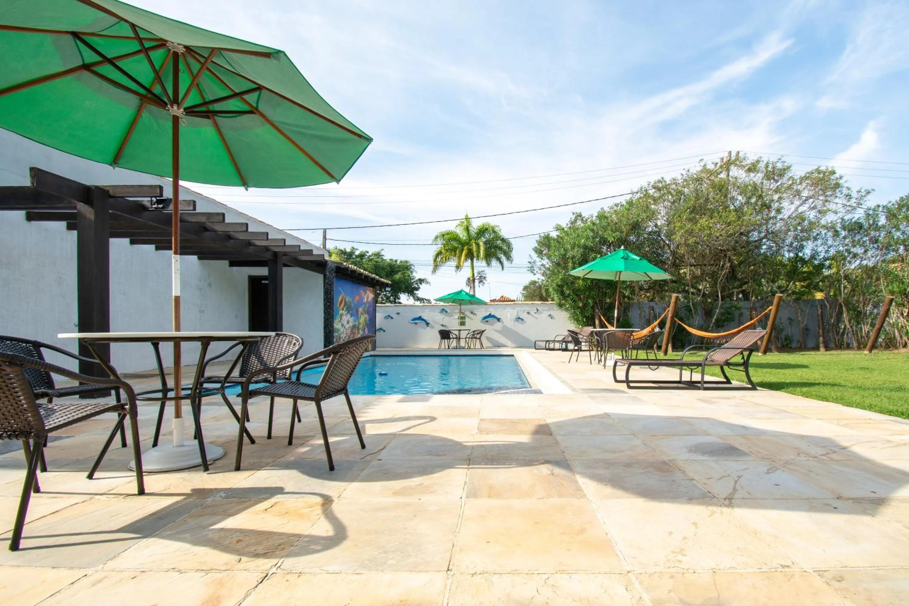 Swimming pool in Pousada Casuarina Ferradura