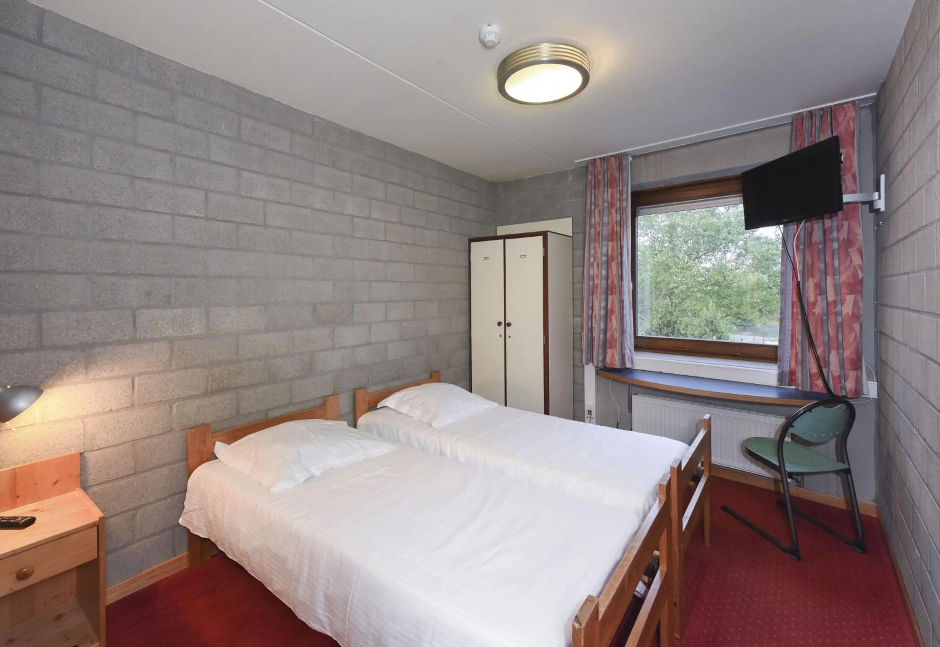 Bed in Vakantiedomein Hoge Duin