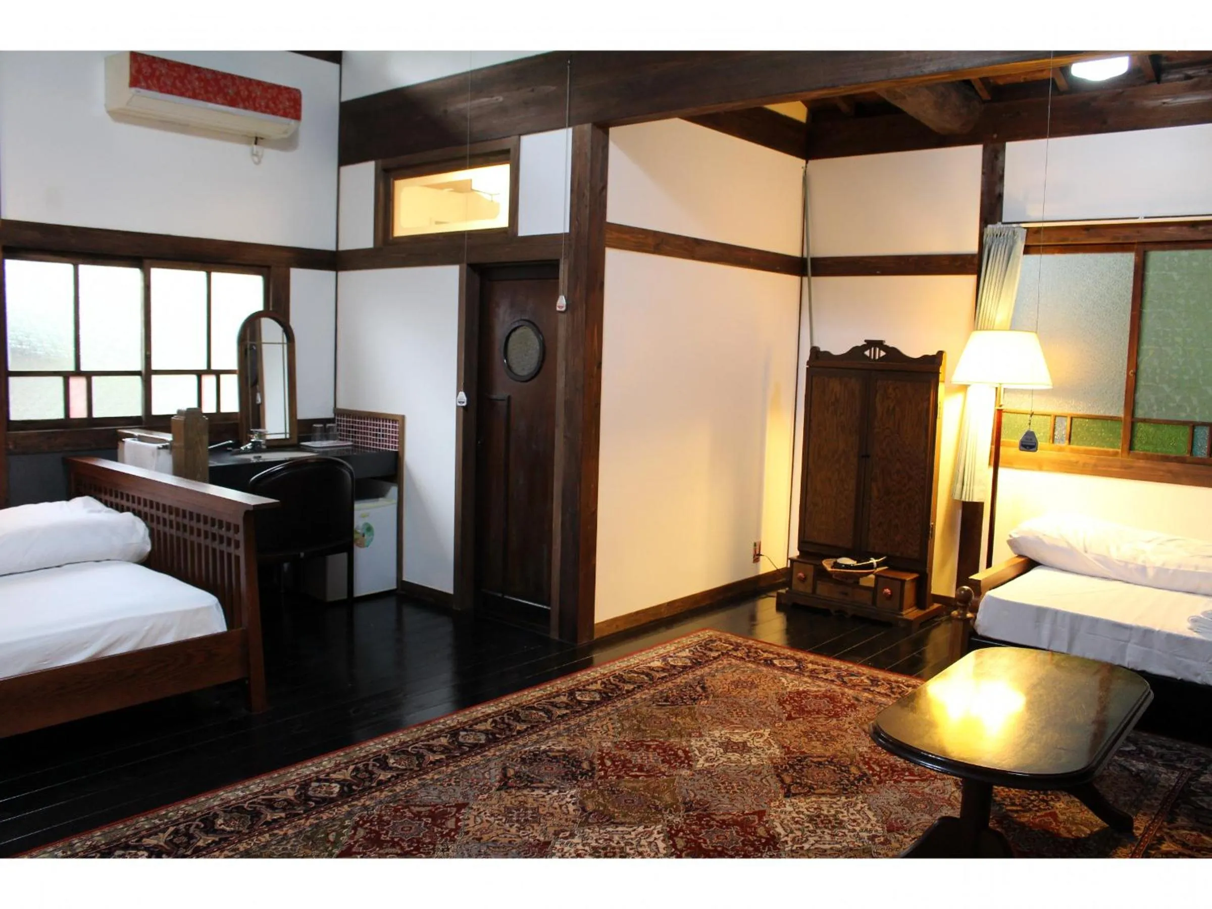 Bed in Kotohira Guest House en