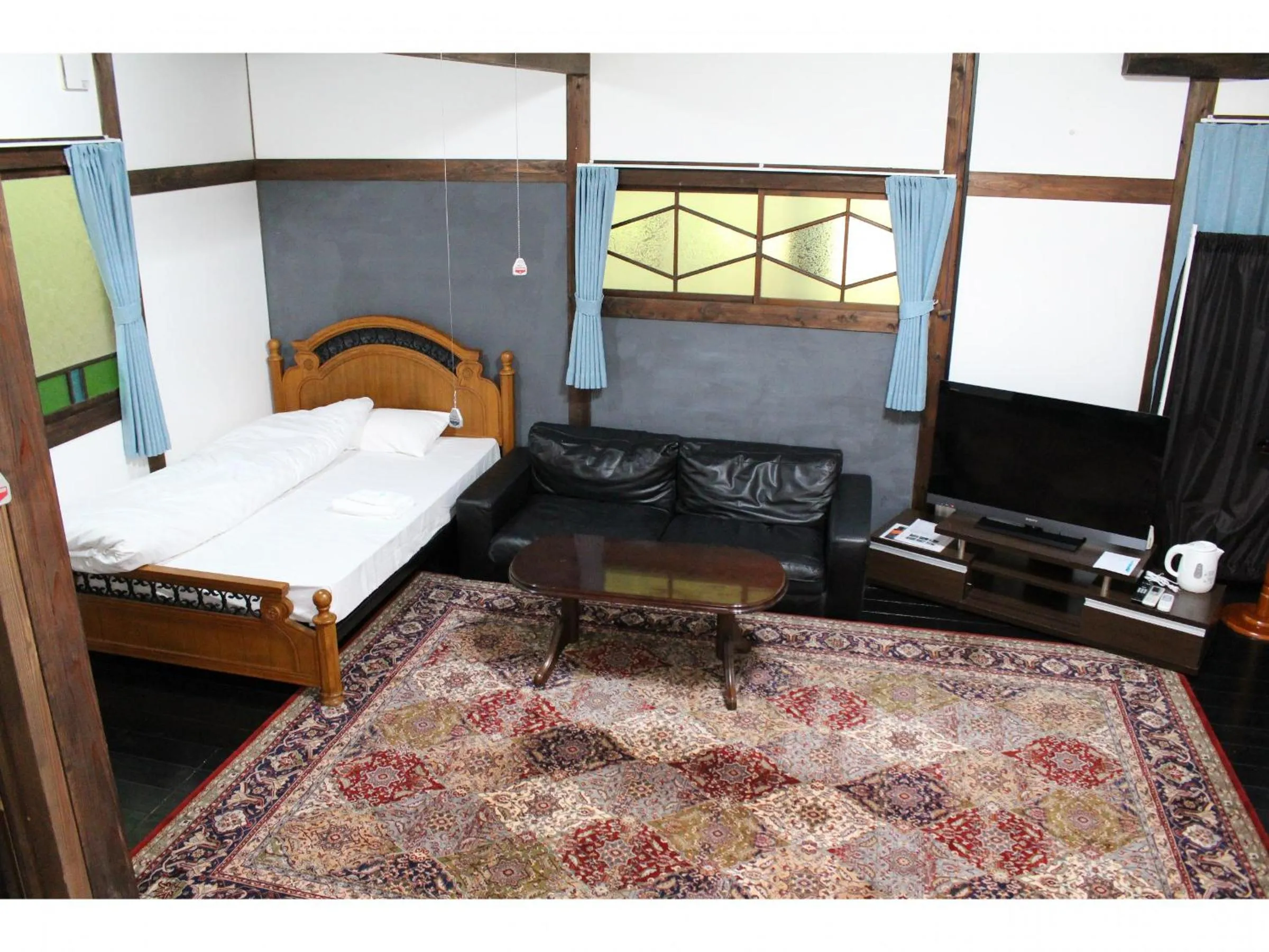 Bed in Kotohira Guest House en