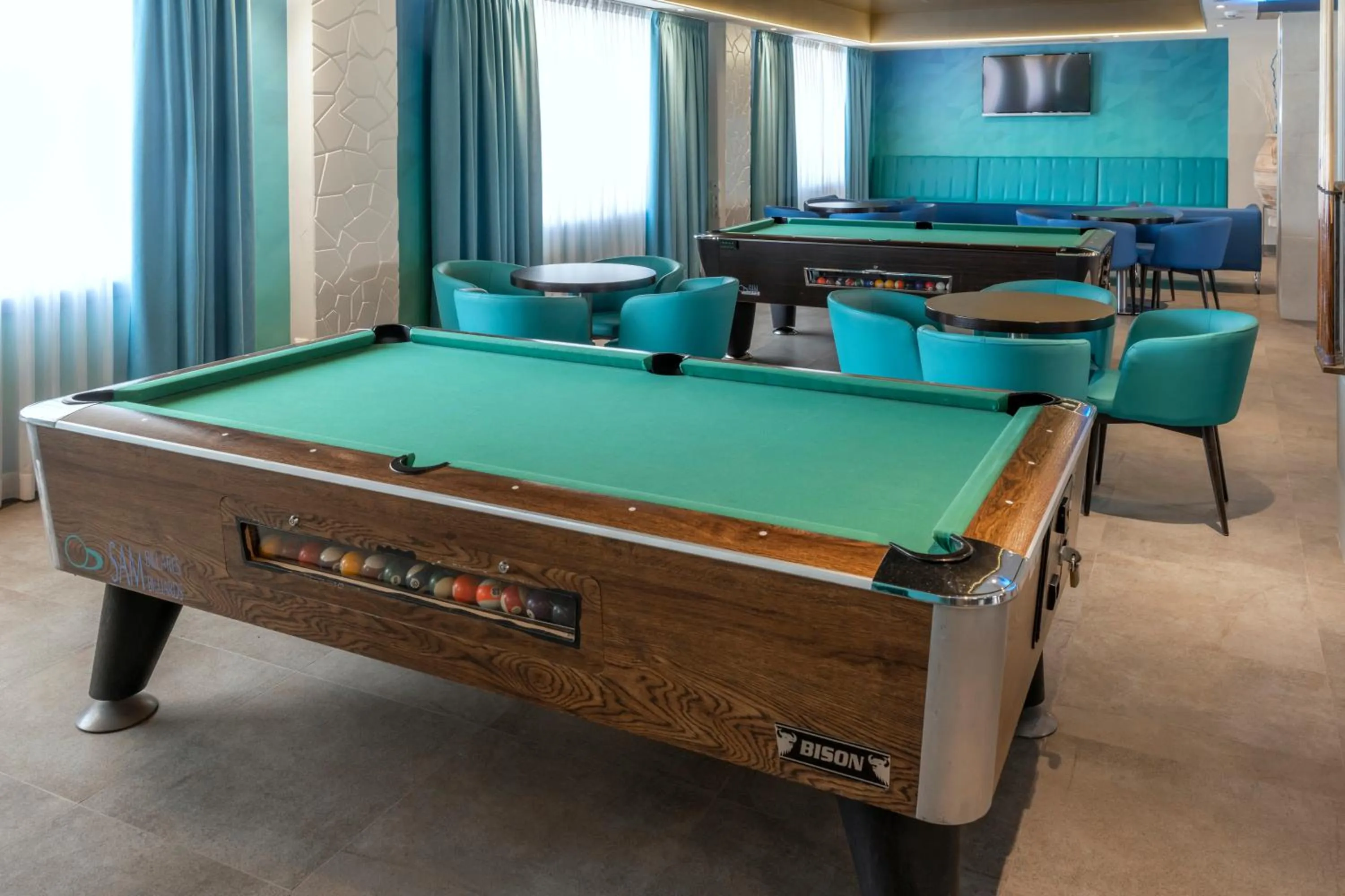 Communal lounge/ TV room in Hotel Alhambra