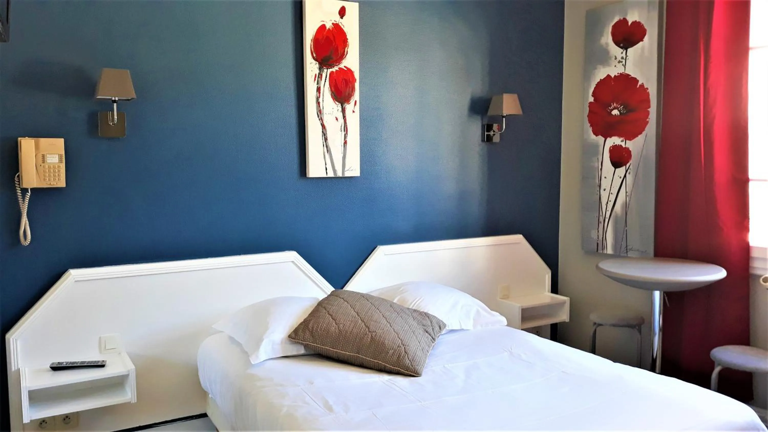 Bed in Hotel Le Reynita