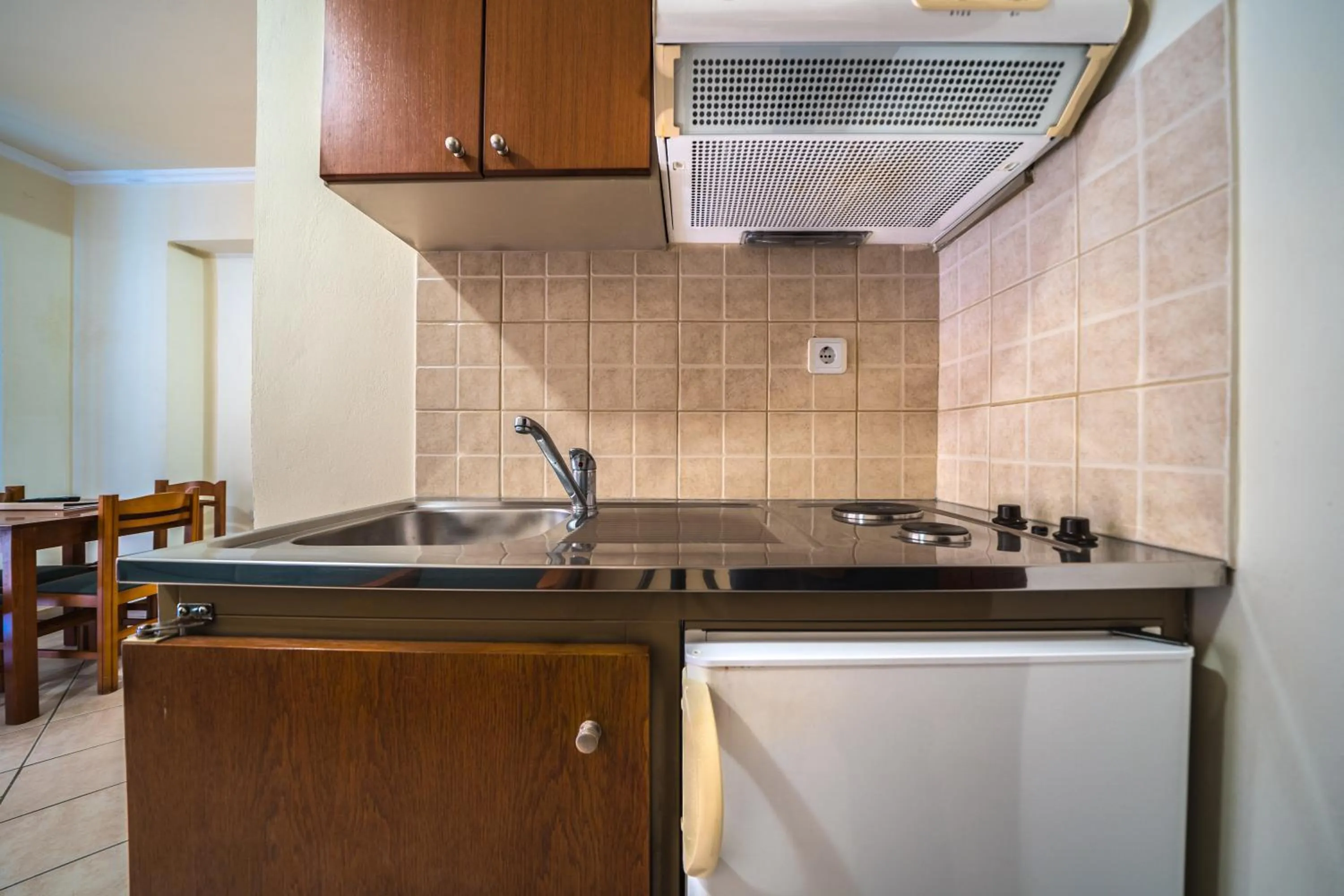 Kitchen or kitchenette in Porto Kalamaki Hotel