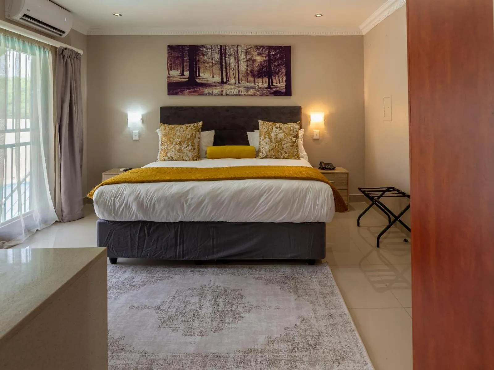 Bed in Global Village Guest House