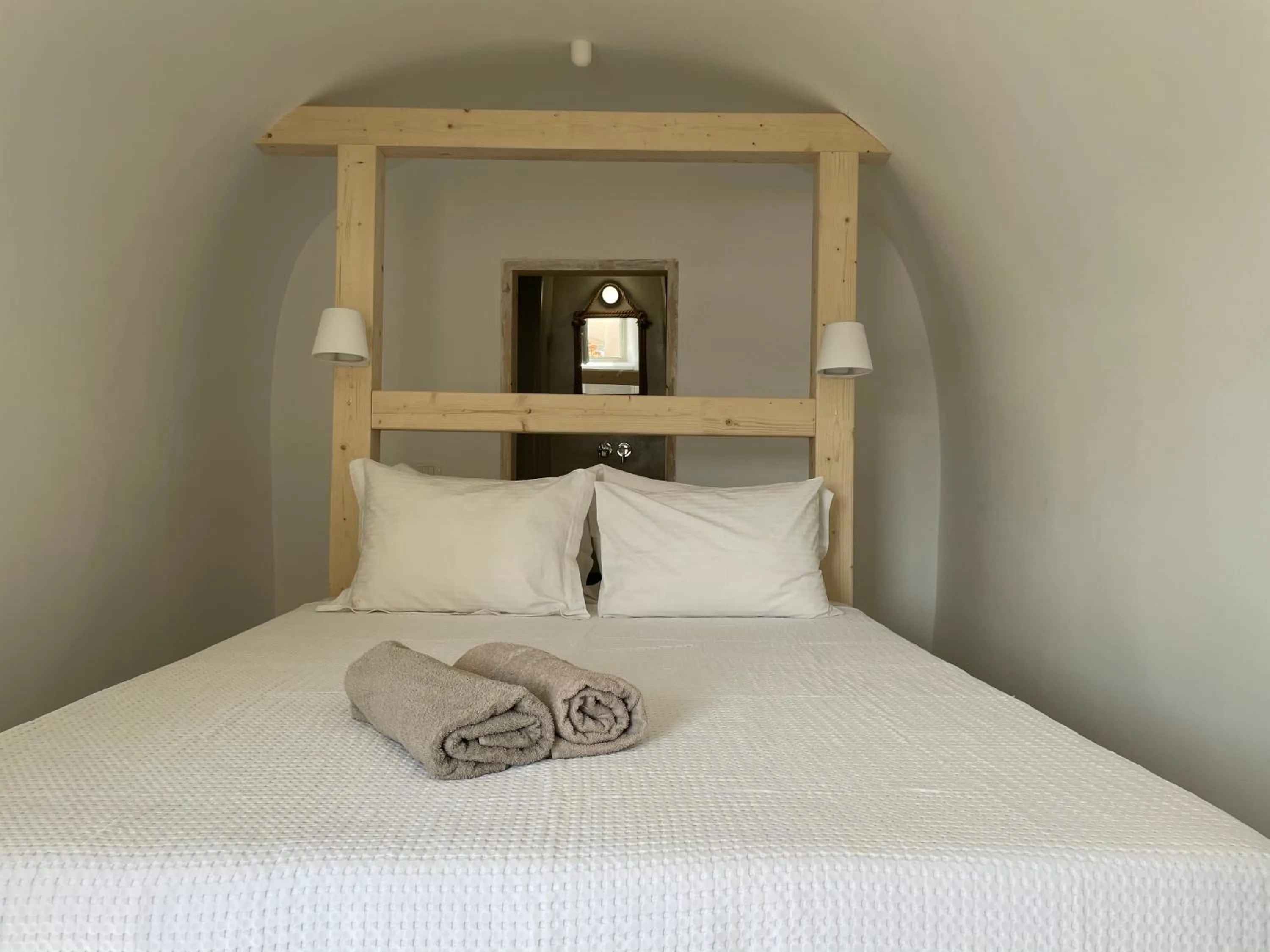 Bed in Cosmoia Cave House