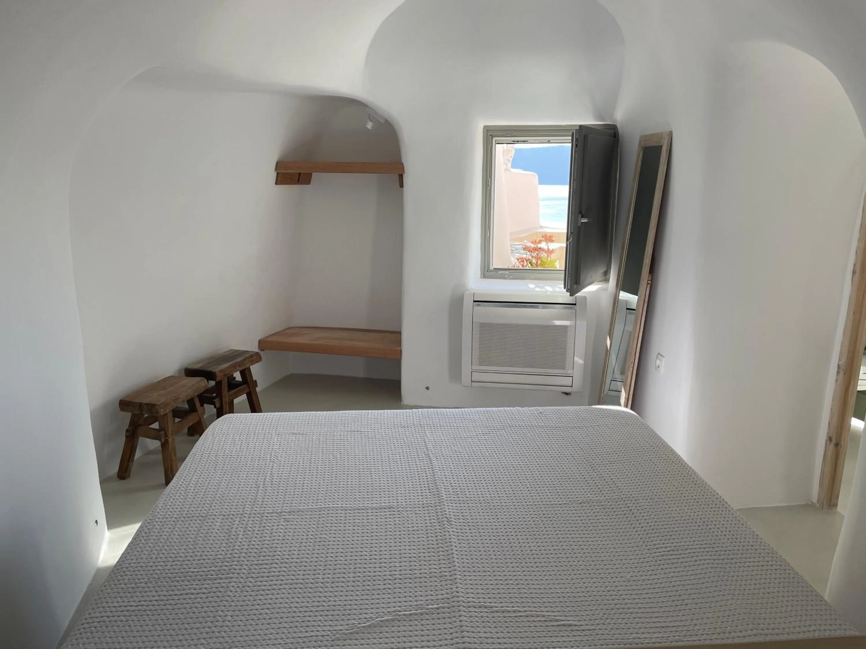 Bed in Cosmoia Cave House