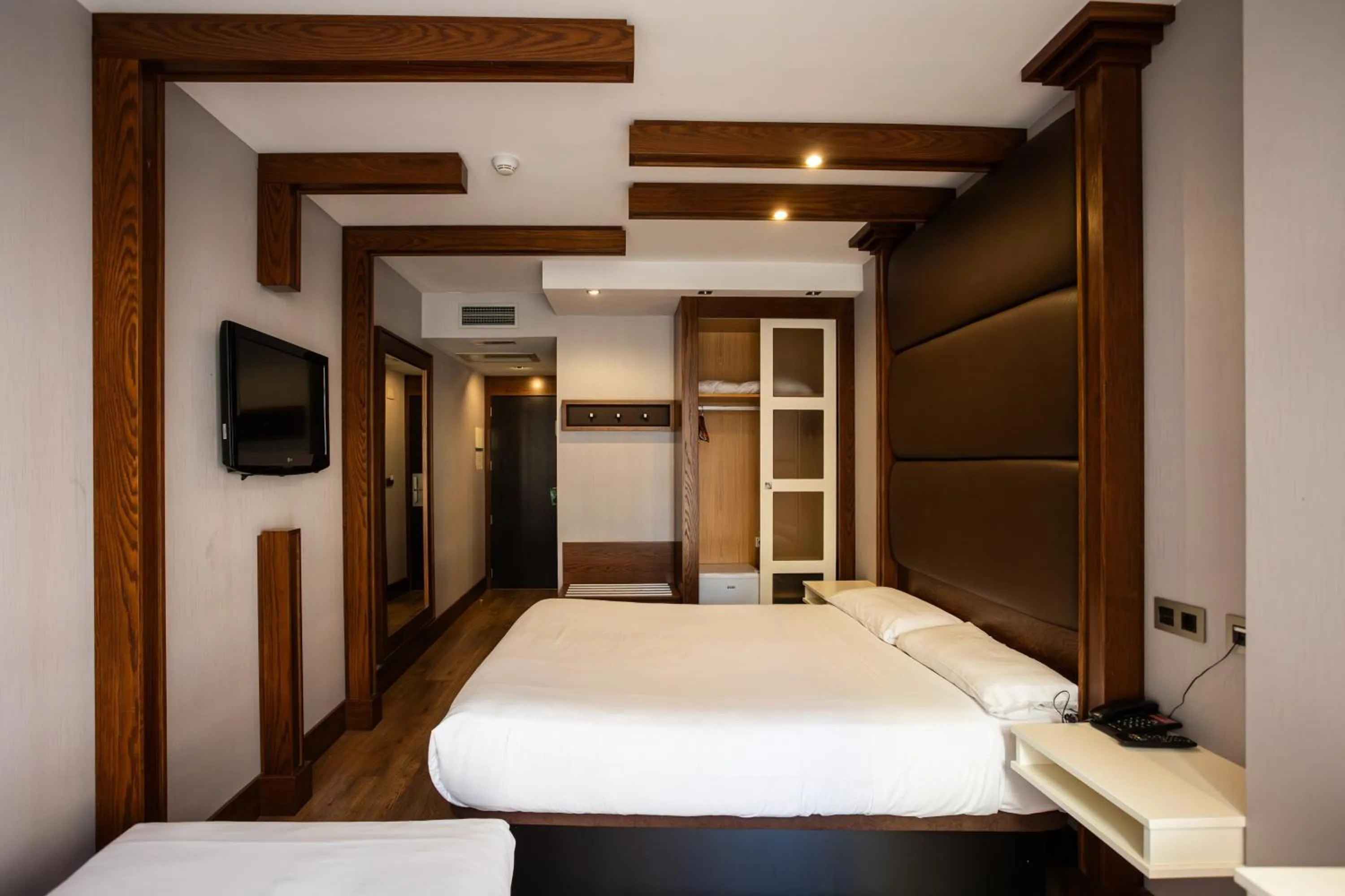 Bed in Hotel Centro Los Braseros