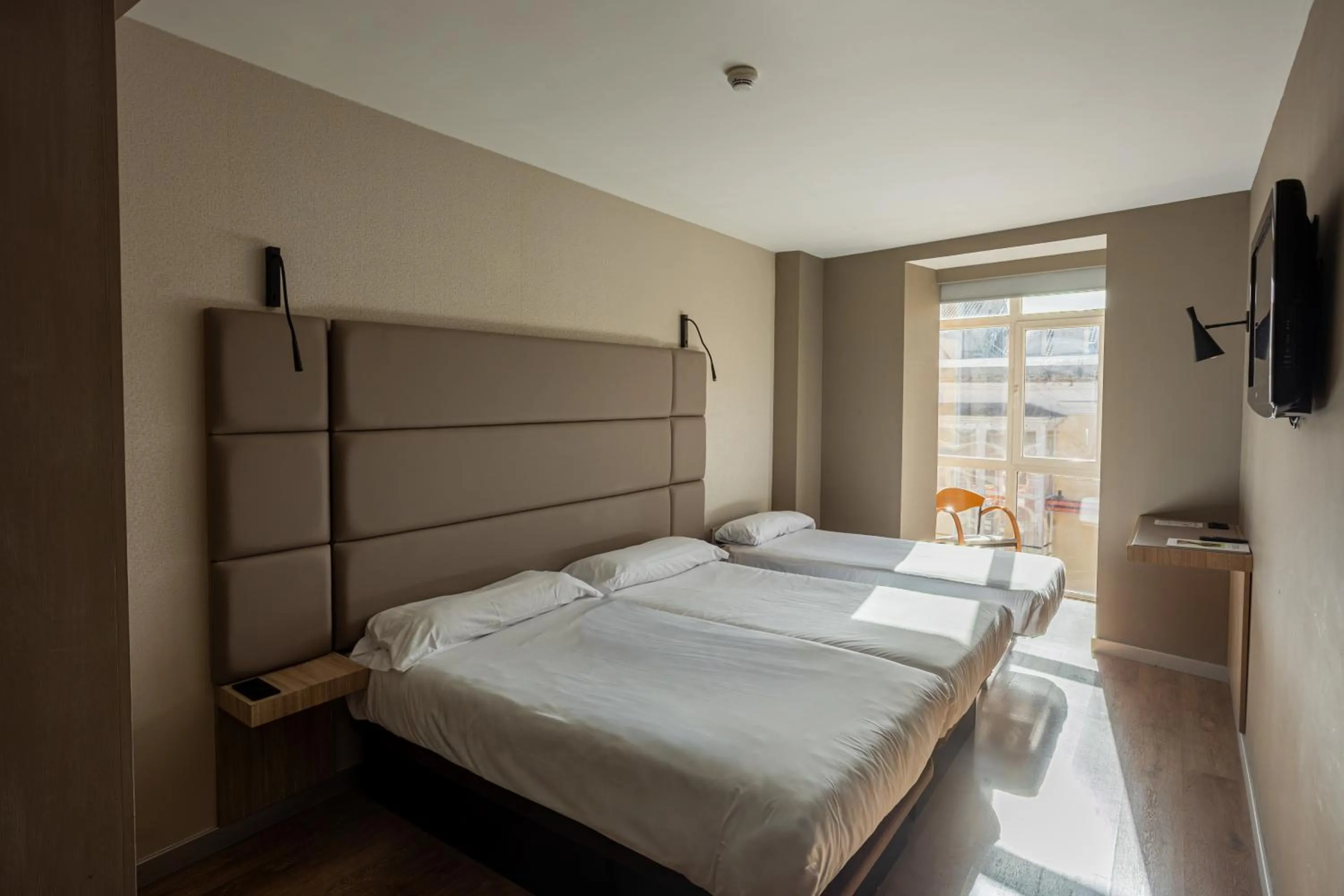 Bed in Hotel Centro Los Braseros