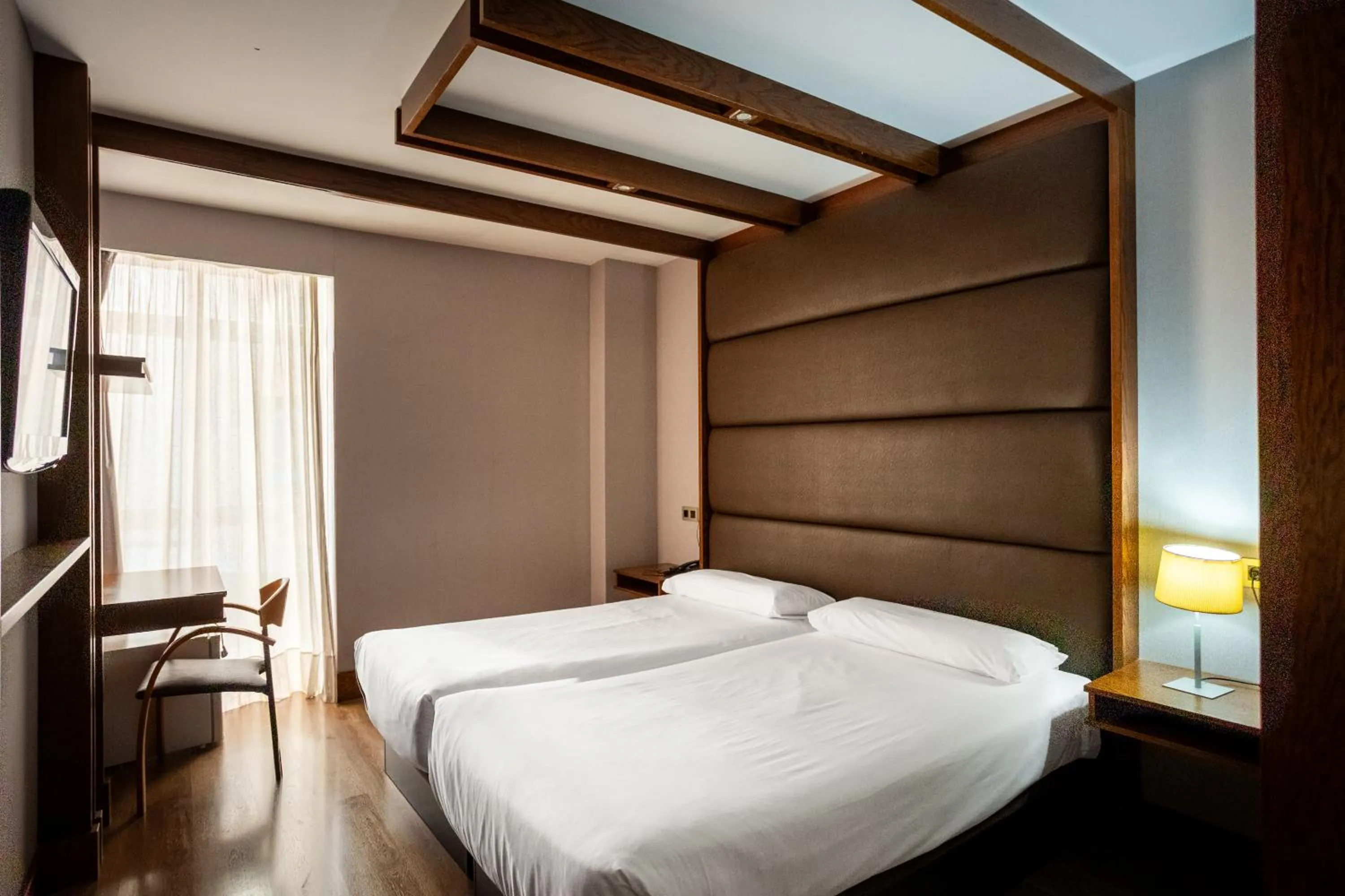 Bed in Hotel Centro Los Braseros