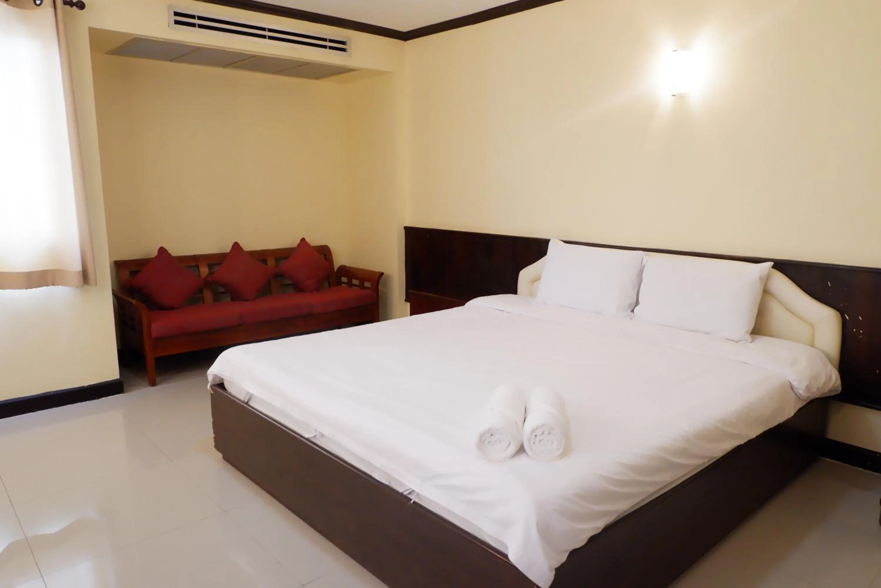 Bed in Auychai Grand Hotel