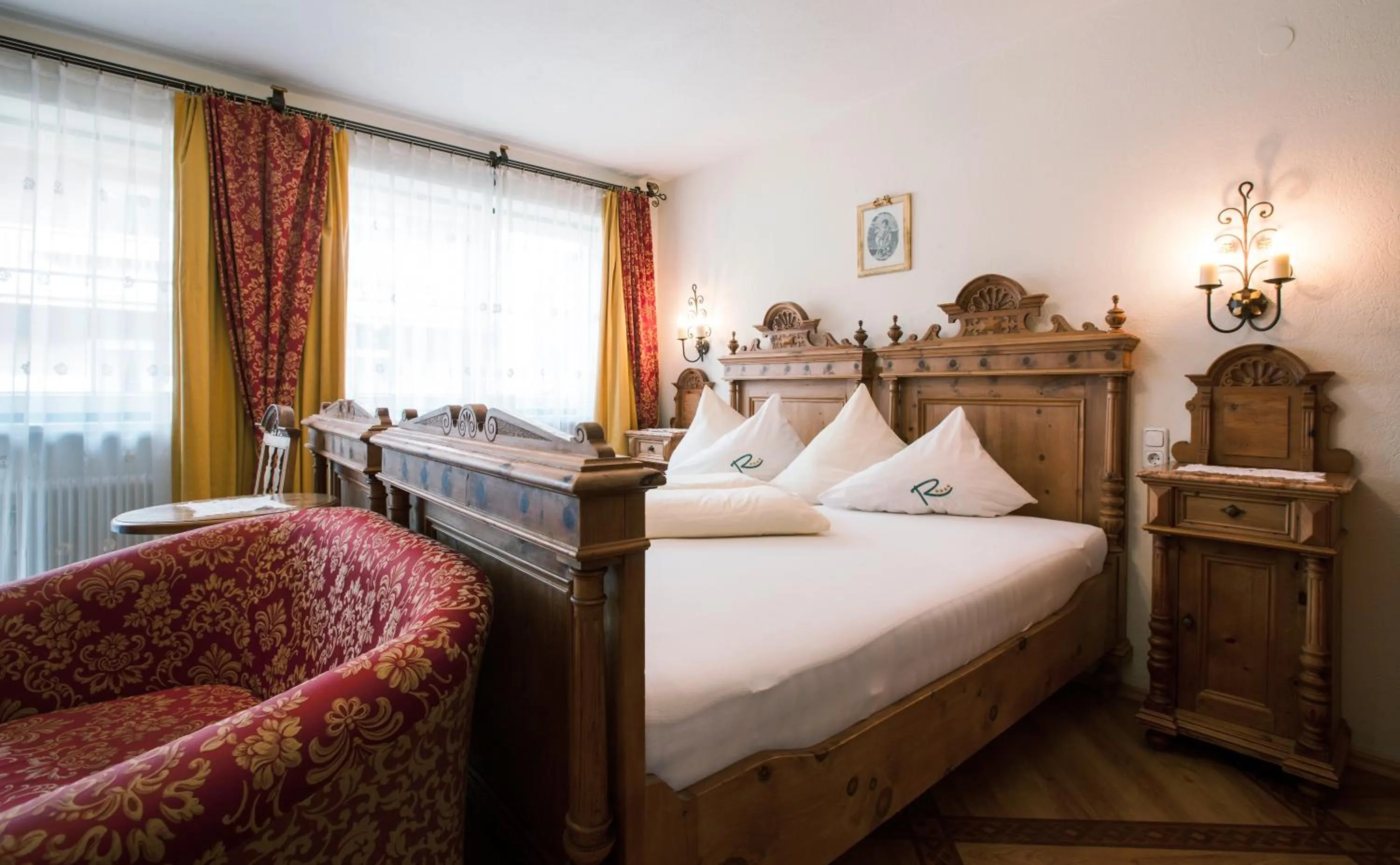 Bed in Sylvana's Wohlfühl Hotel