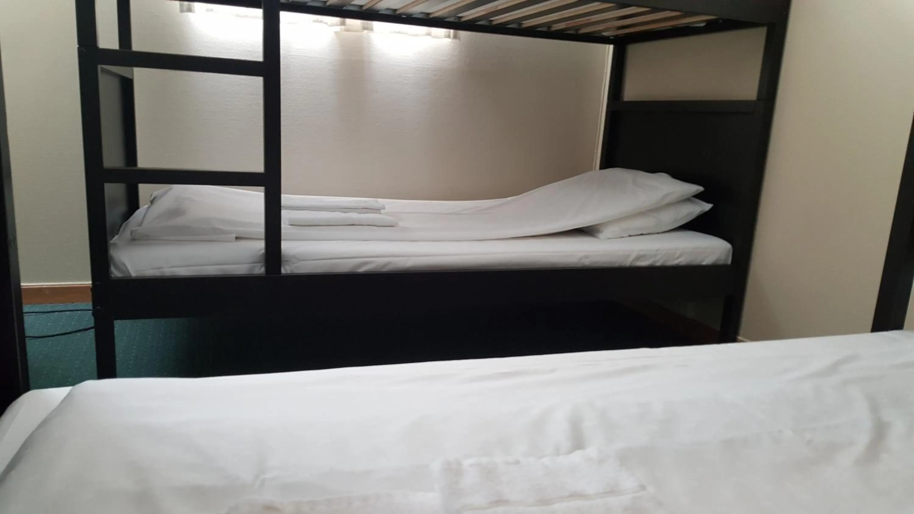 Photo of the whole room, Bed in Skeisvang Gjestgiveri