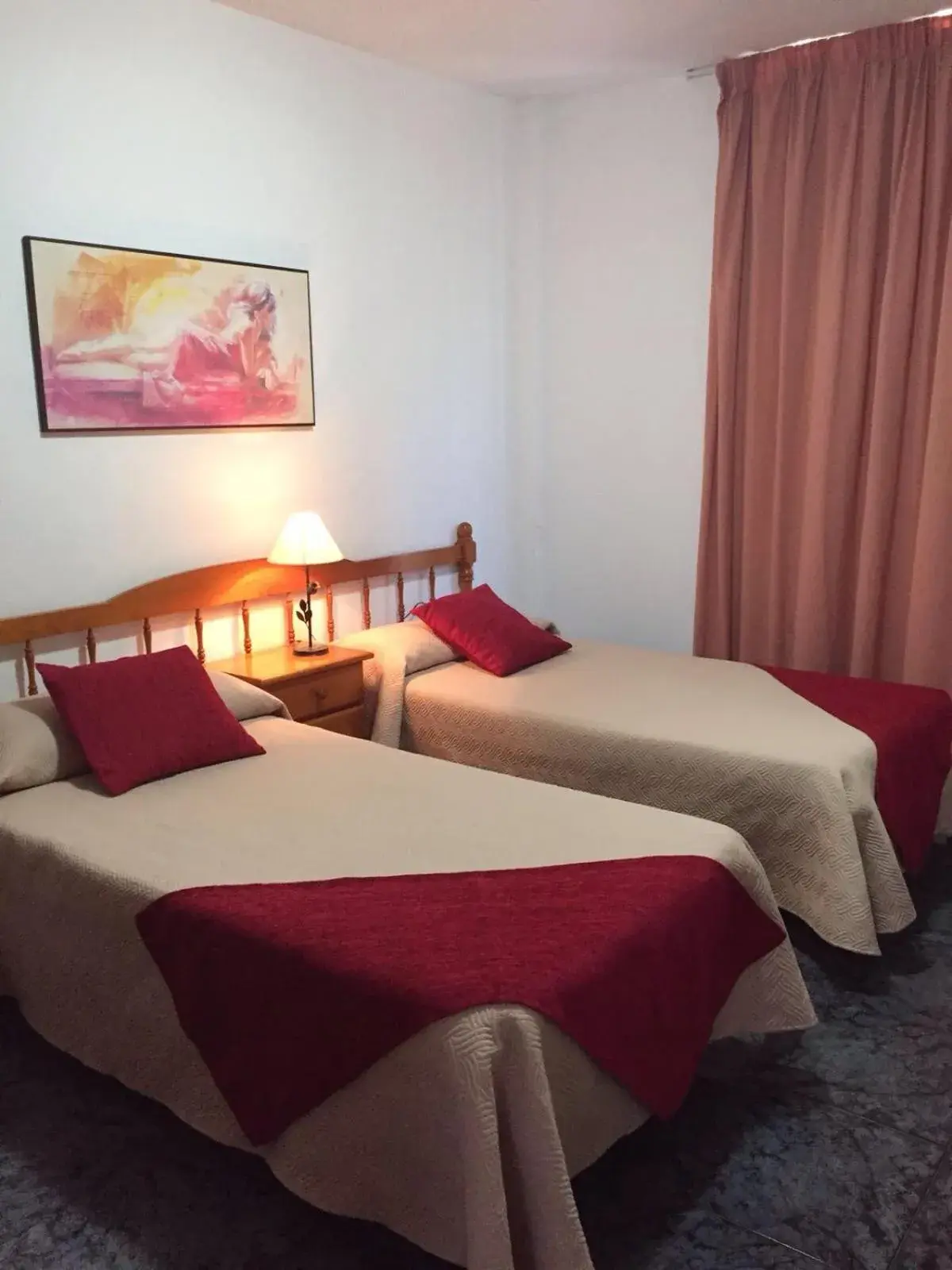 Property building, Bed in Apartamentos Jucar Property building, Bed in Apartamentos Jucar