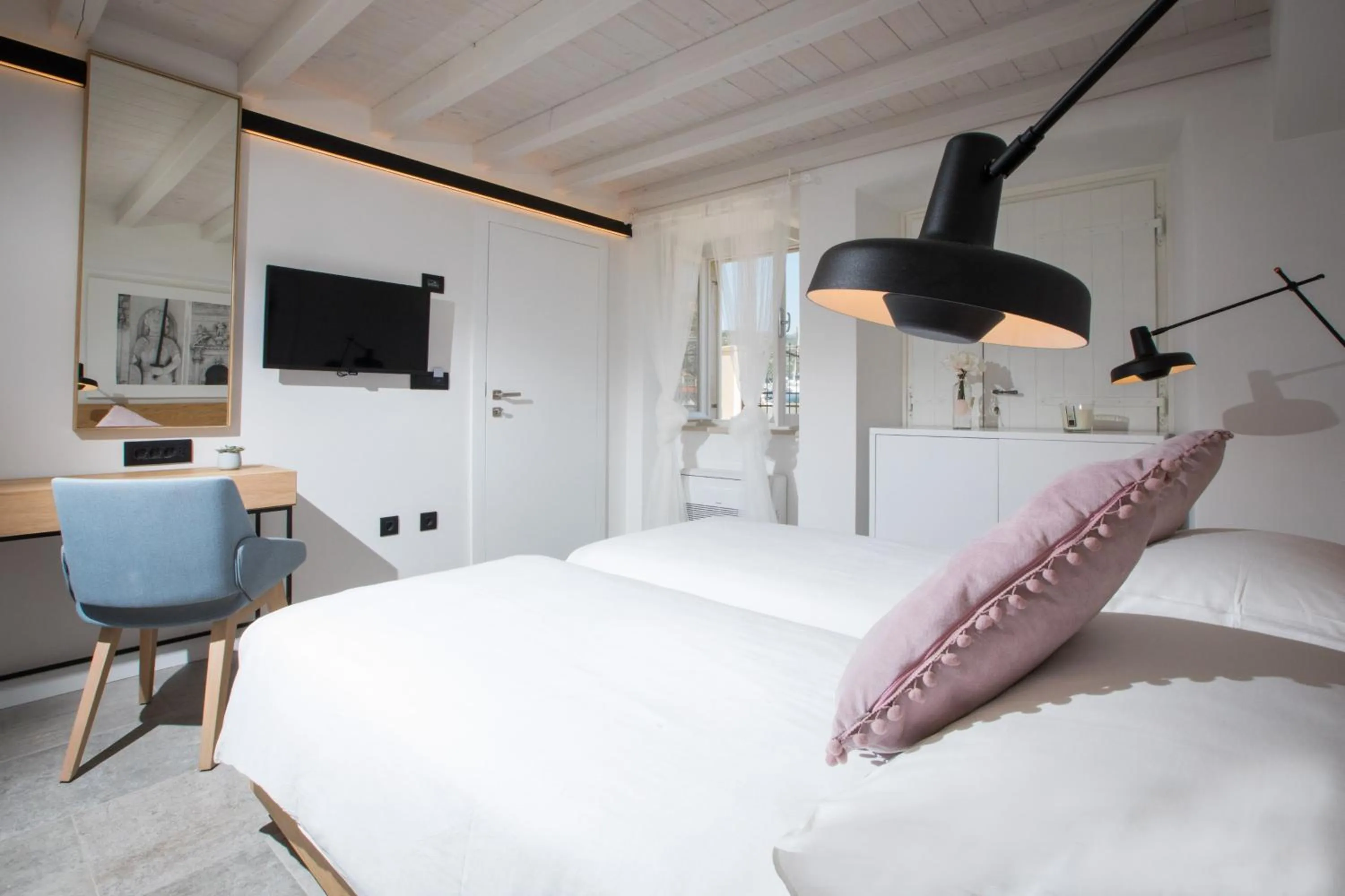 Bed in Bova Luxury Rooms